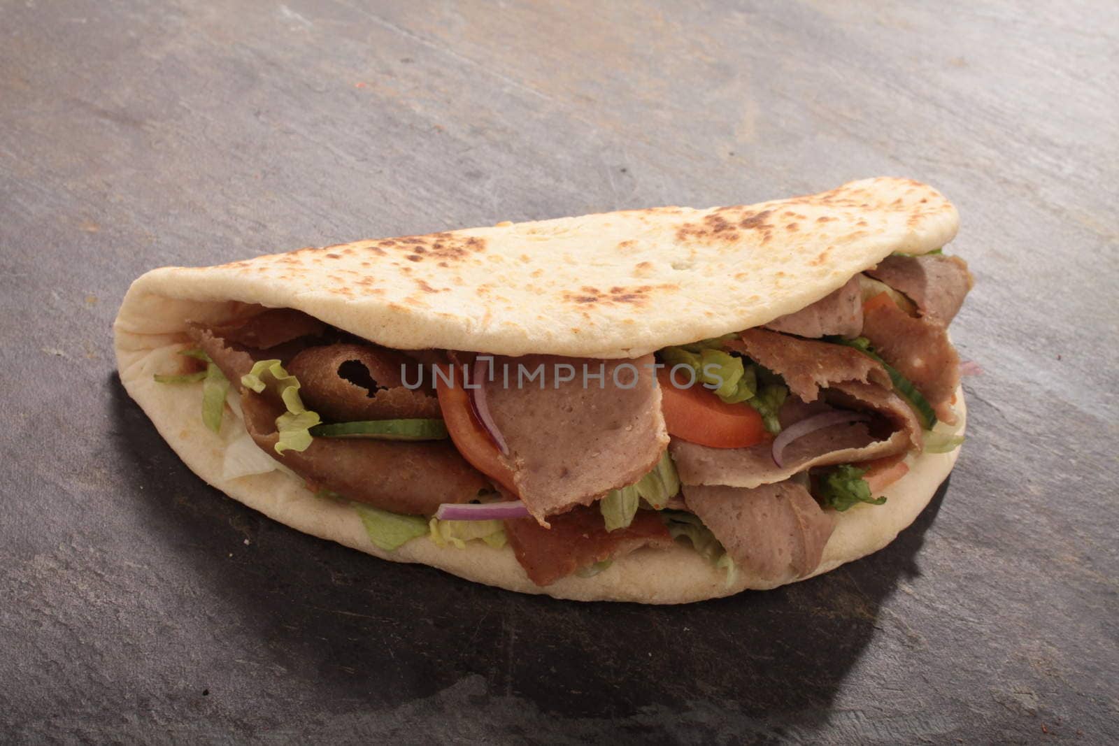 indian tikka shish donner wrap sandwich