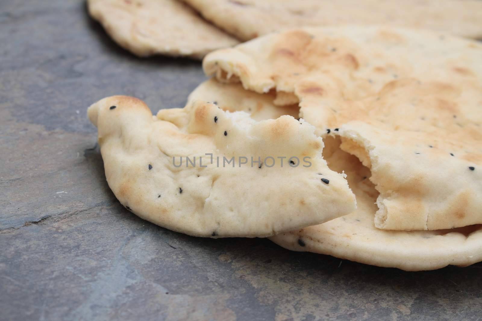 Indian naan bread and poppadum