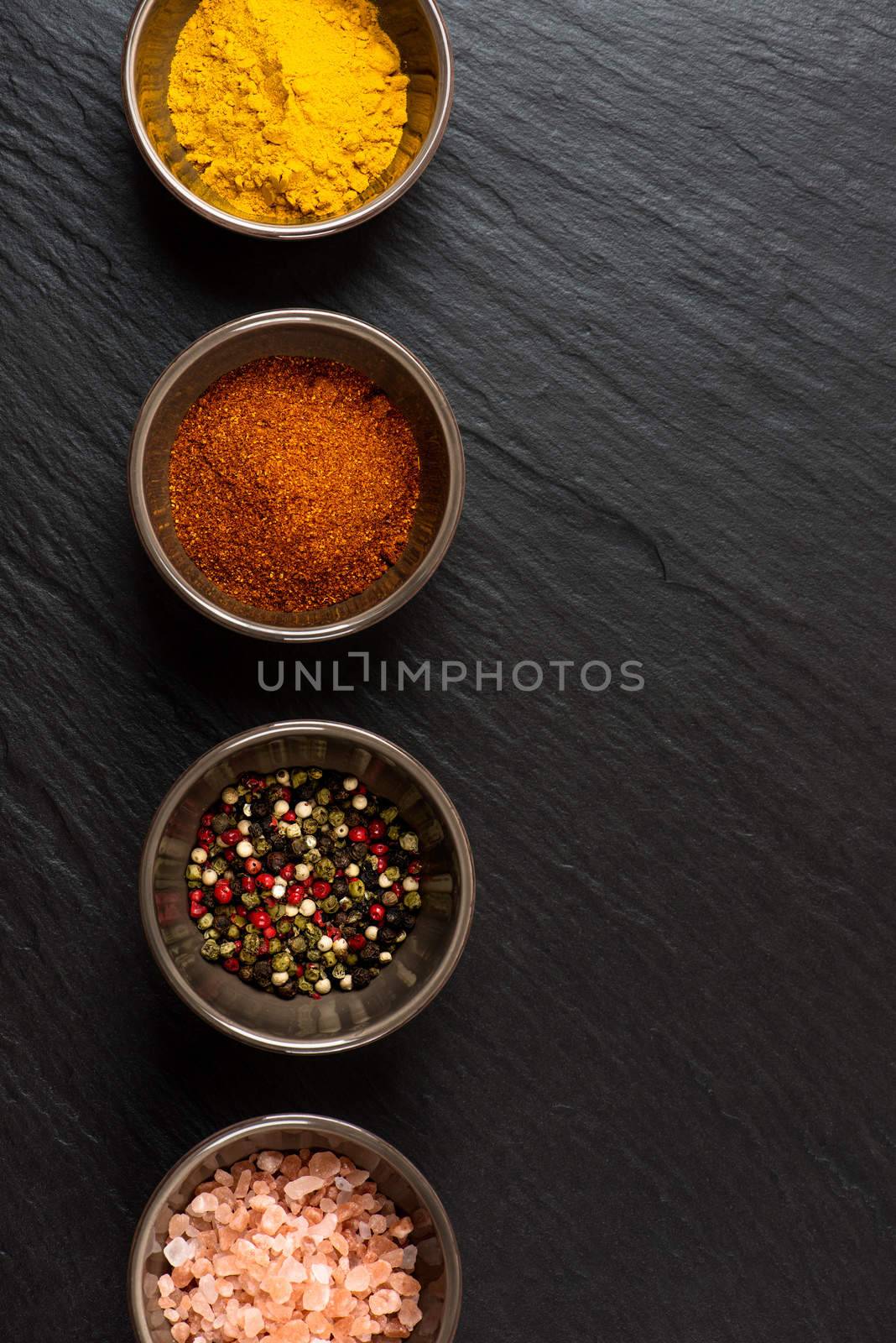 Spices in bowl by Nanisimova