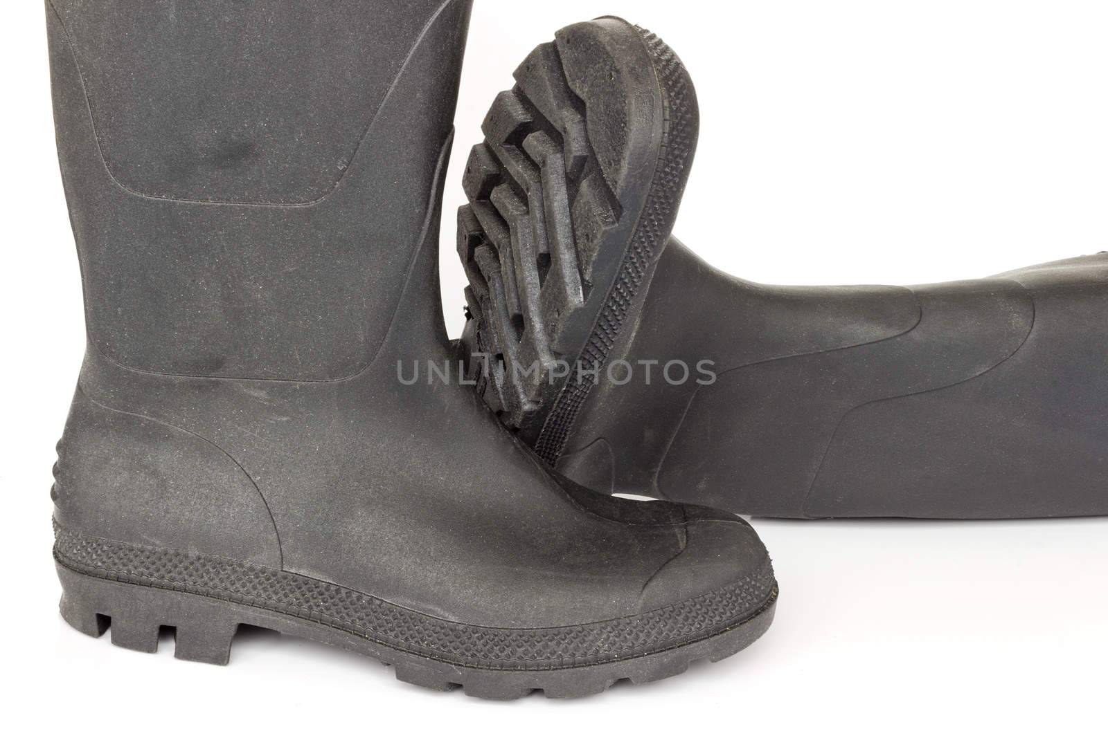 Rubber boots on white background