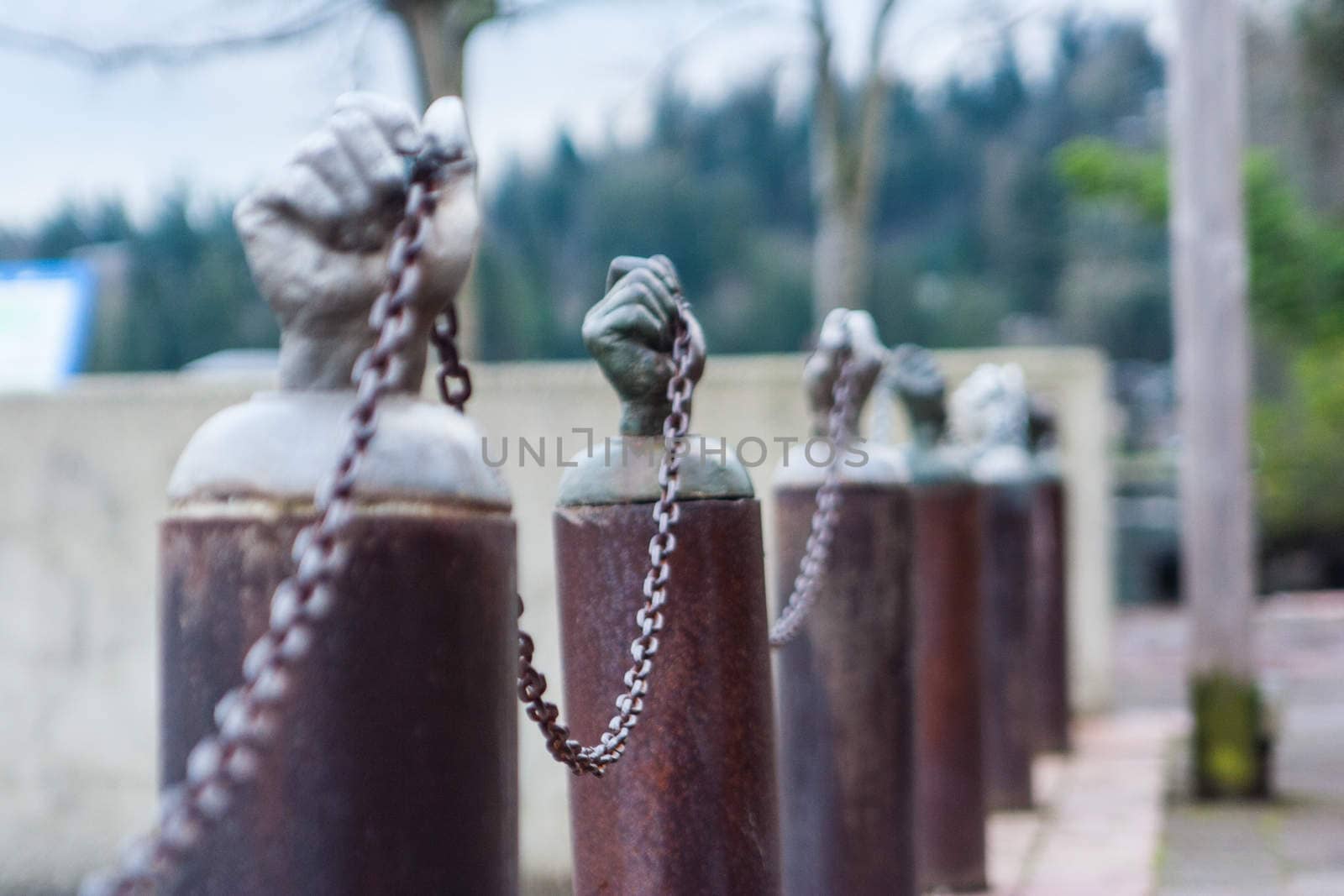 Hands holding a security chain