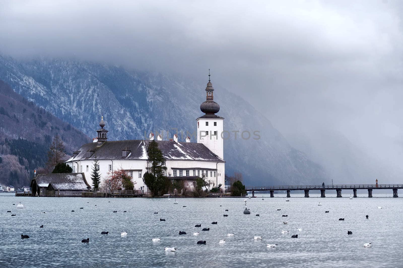 Monastery on the island of alpine lake in Gmunden by Salzburg, Austria