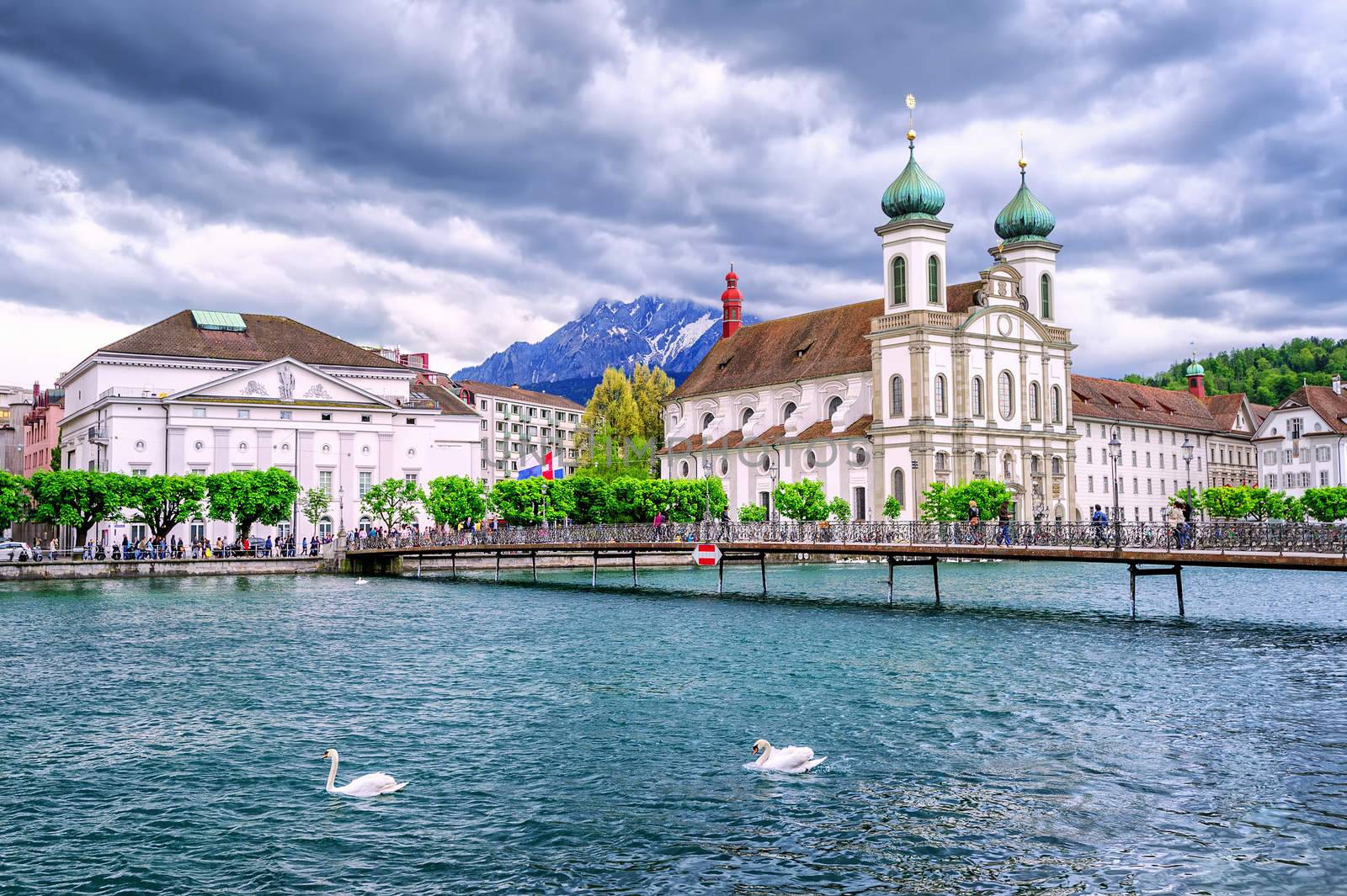Lucerne, Switzerland, Jesuite churche, Reuss river and Mount Pilatus in background