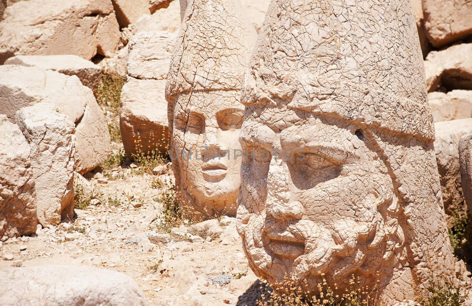 Antique statues on top of Nemrut mountain, Turkey by GlobePhotos