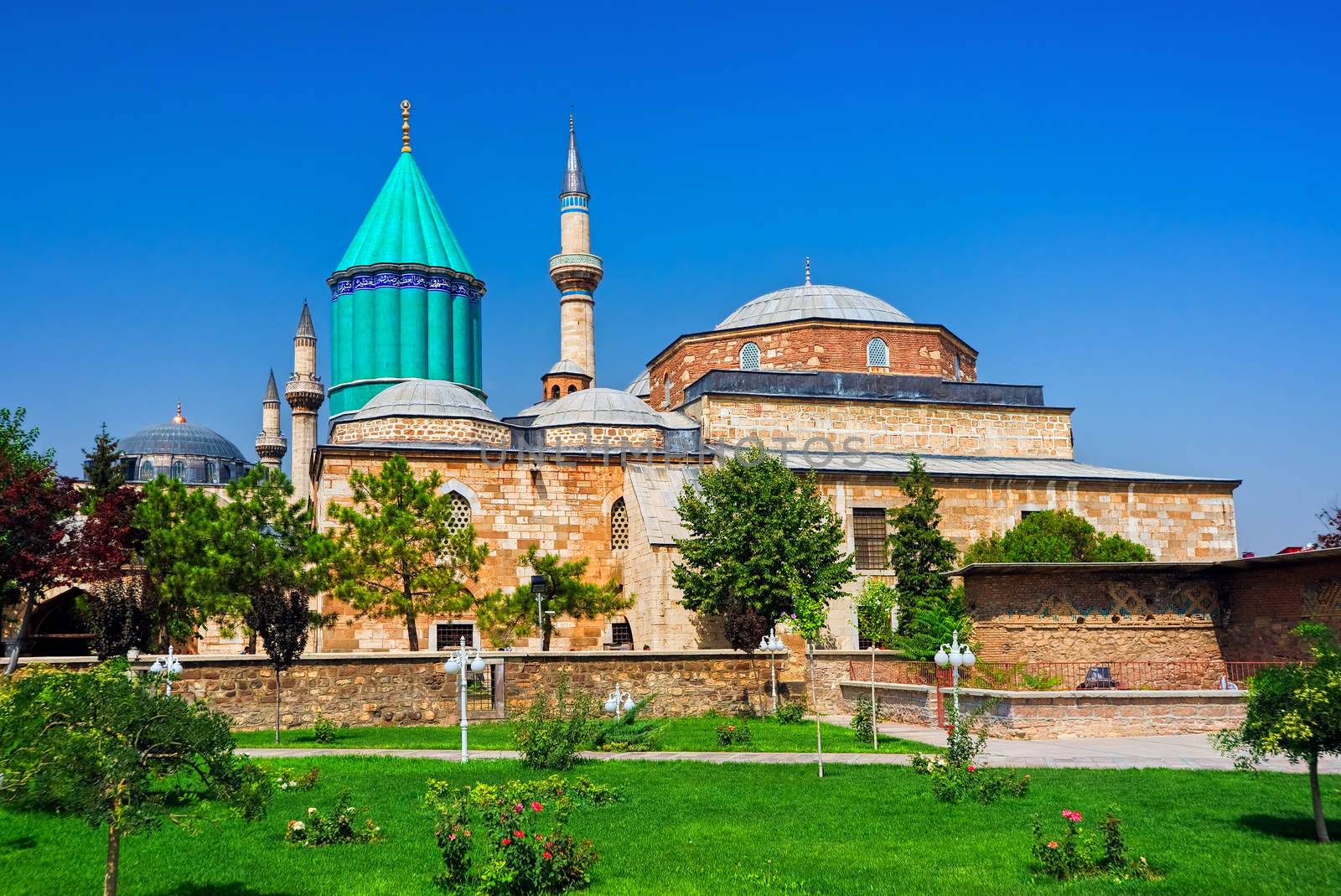 Tomb of Mevlana, the founder of Mevlevi sufi dervish order, with prominent green tower in Konya, Turkey