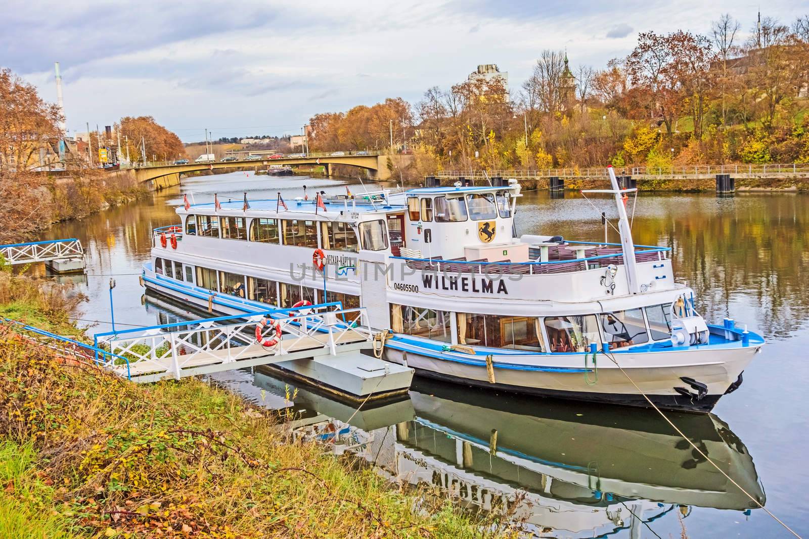 Stuttgart, Germany - November 14, 2015: Passenger shipping company Neckar Kaept'n - Flagship MS Wilhelma, at the landing pier near the famous zoo of Stuttgart Wilhelma. Length: 37,20 m, width: 7,30 m, tonnage: 67 t.