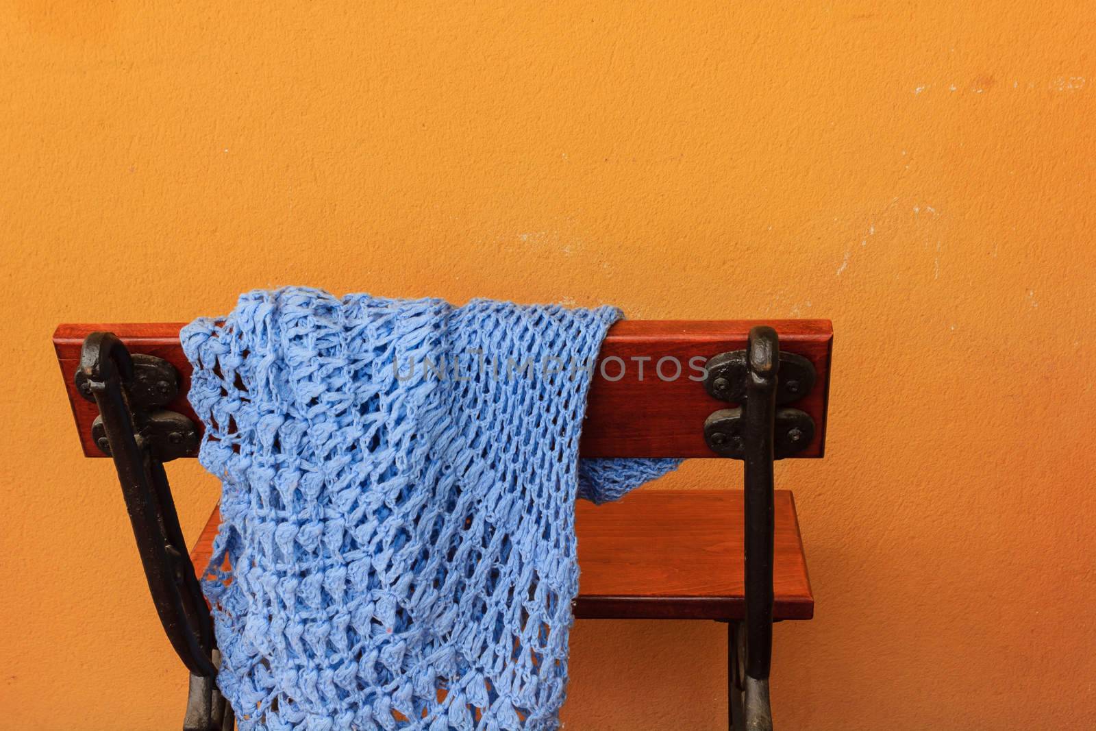 a bench with a shawl abandoned by moorea
