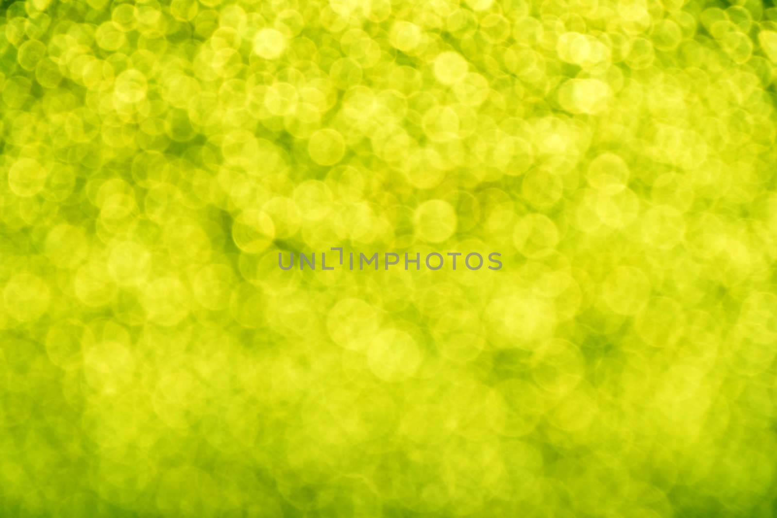 Spring glitter fresh green bright magic fairy light circles abstract blur effect background