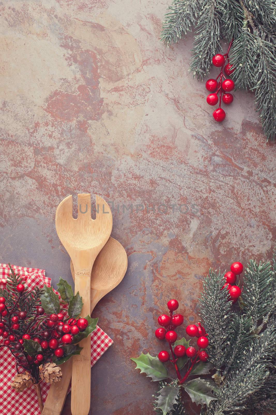 Christmas background with Old wooden kitchen utensils and Christmas decoration for a menu card. Top view, vintage style, blank space