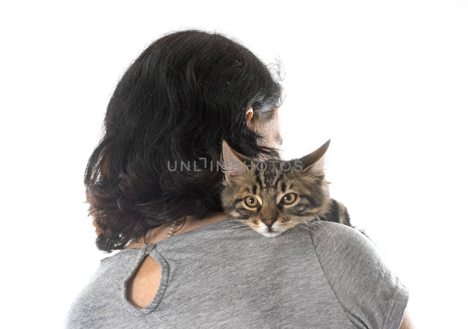woman and kitten in front of white background