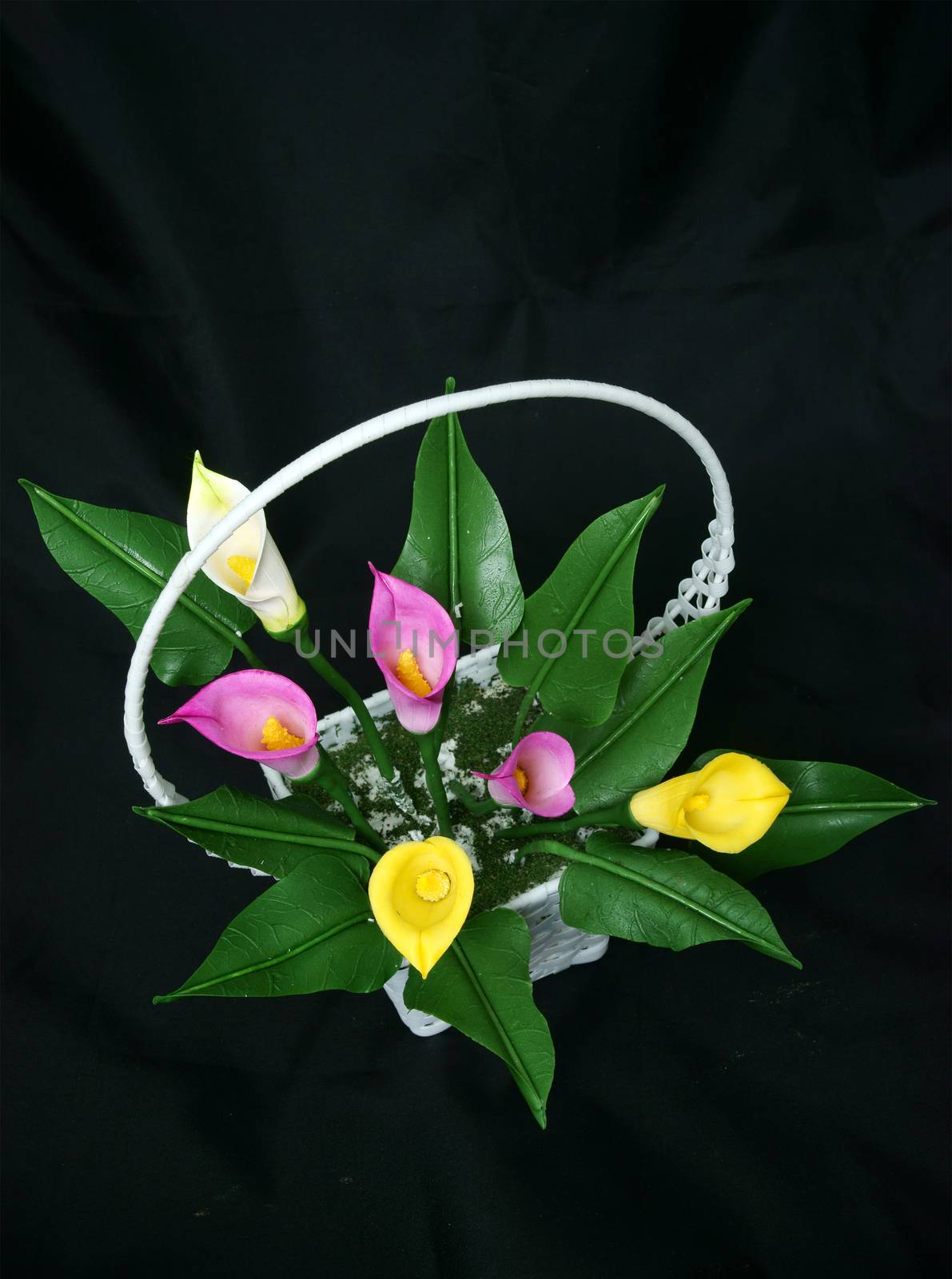 Amazing handmade product on black background, clay flower as pink lotus flower, orange orchid, violet bloom, strawberry pot make home made, beautiful artificial flowers