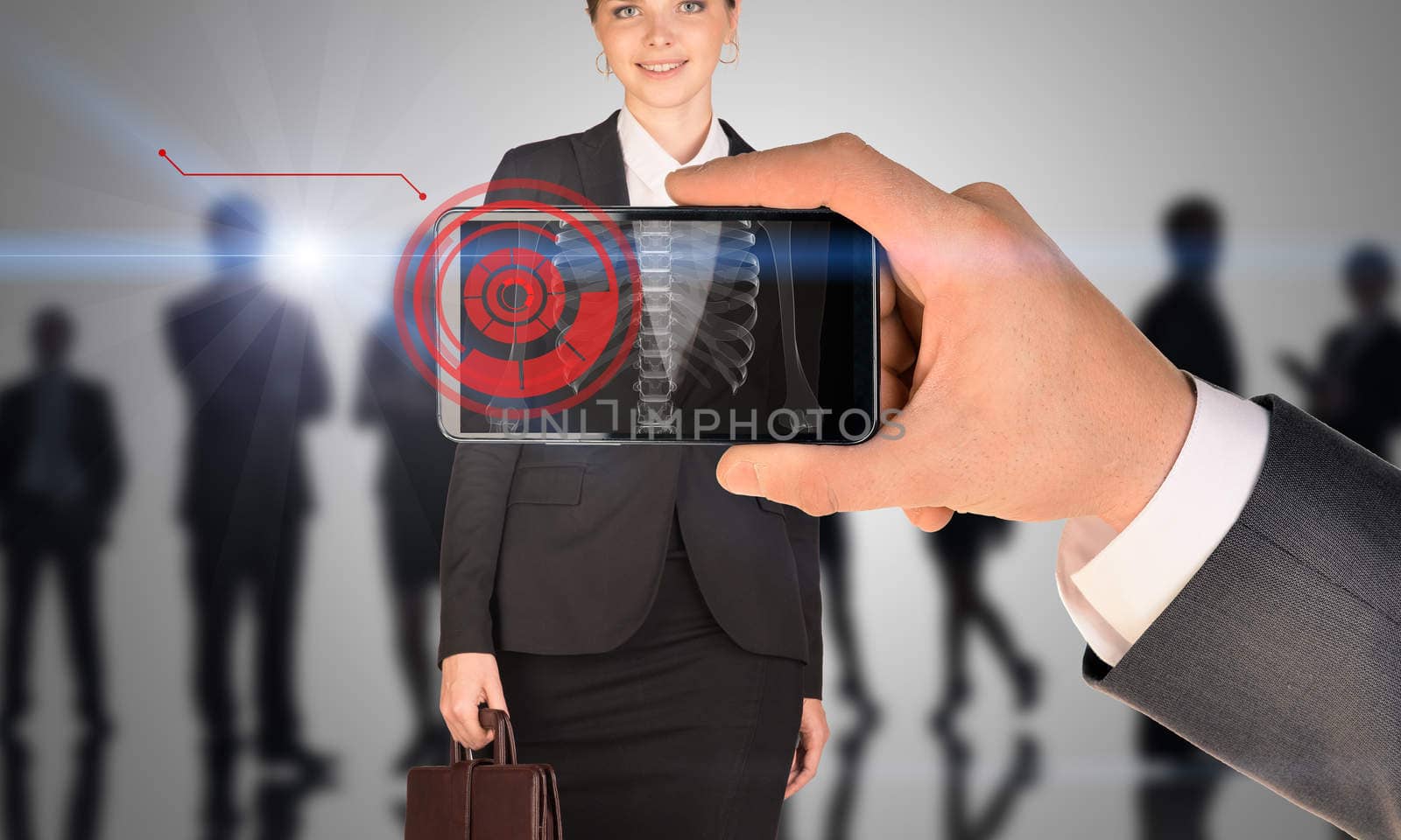 Businessman holding smartphone with x-ray of woman