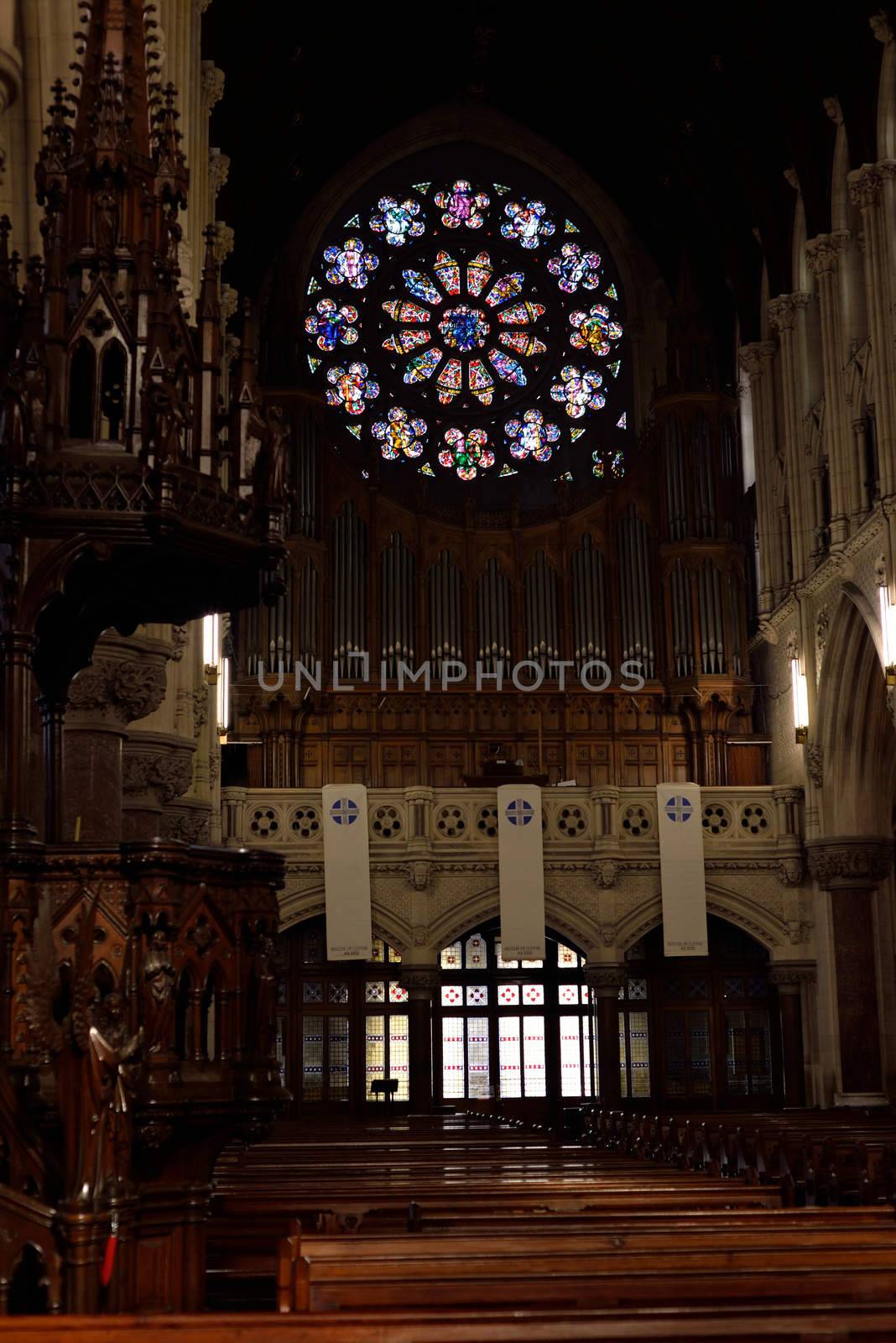 interior windows and seats of St Colman's Cathedral by morrbyte