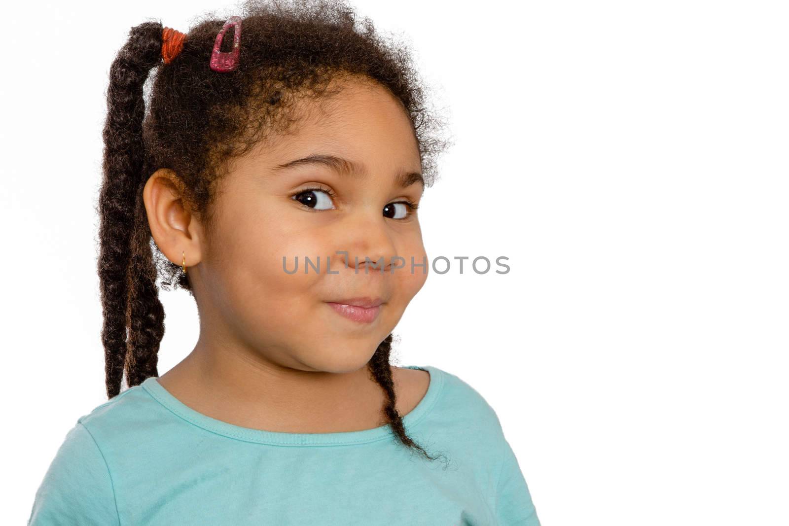 Close up Charming Four Year Old Girl Looking at the Camera Positively Against White Background.