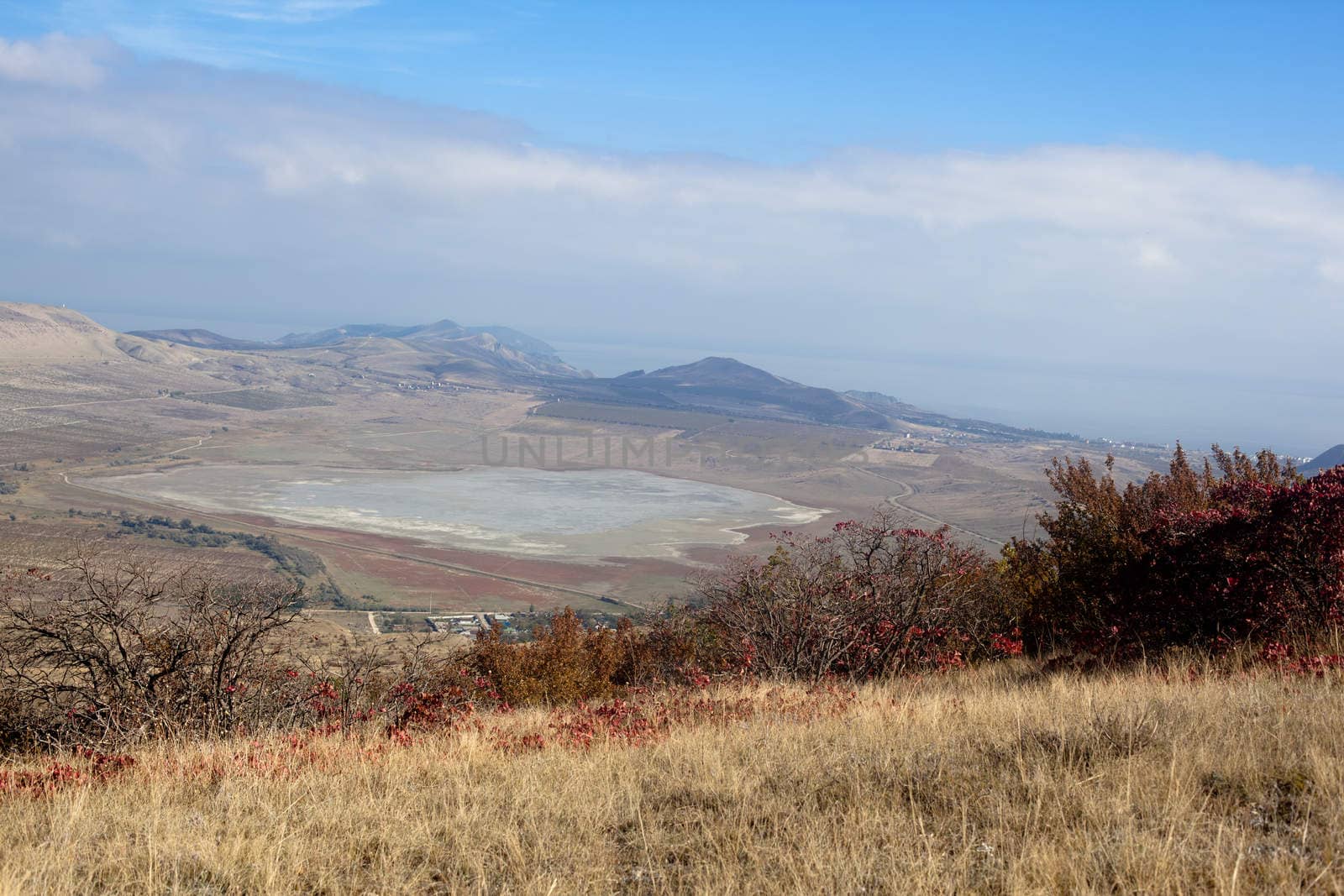 An autumn valley with blue sky
