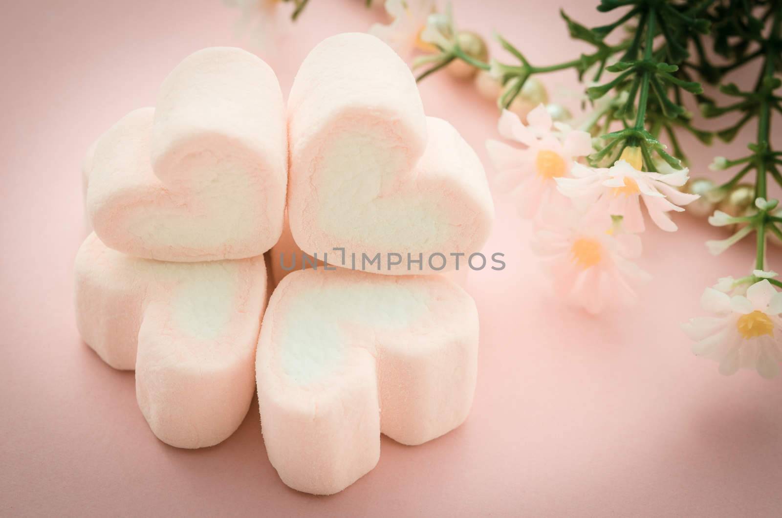 sweet heart shape of pink marshmallows. by Gamjai