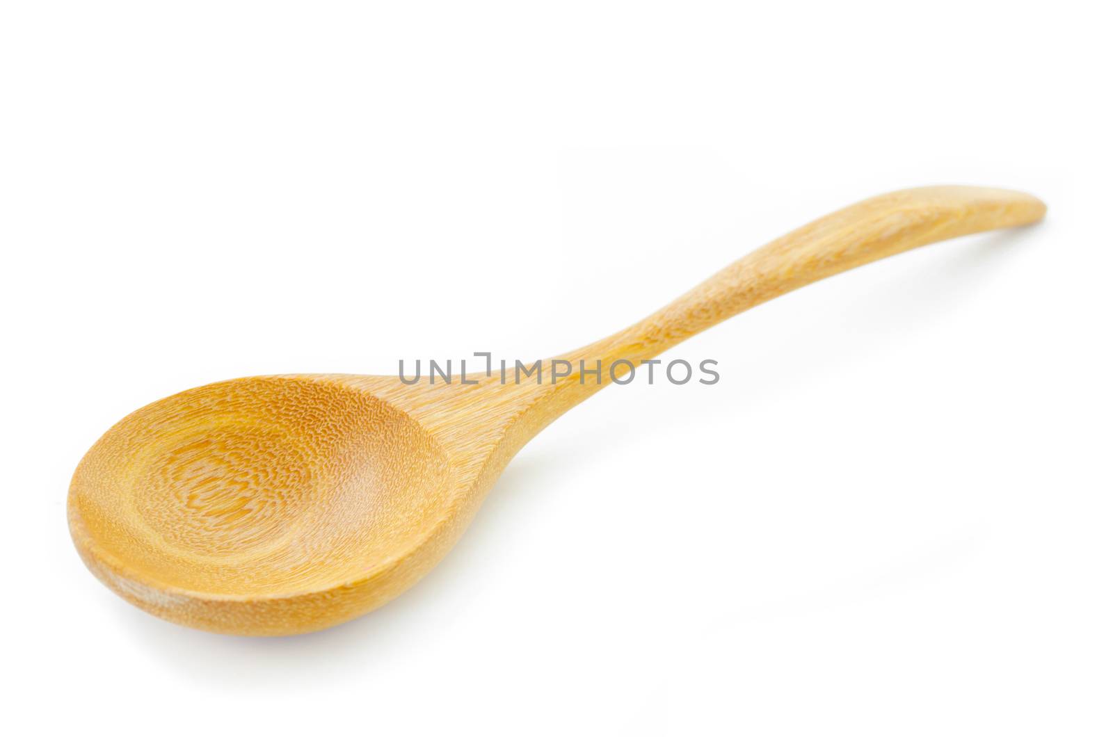Used wooden spoon isolated on white background.