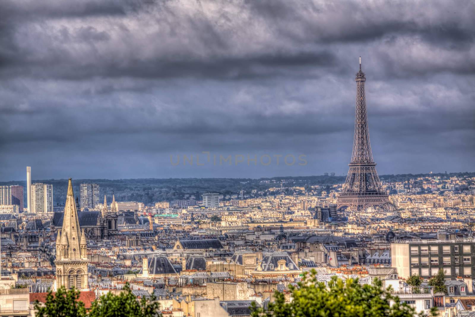 Dramatic stormy clouds forming over Paris with Eiffel Tower