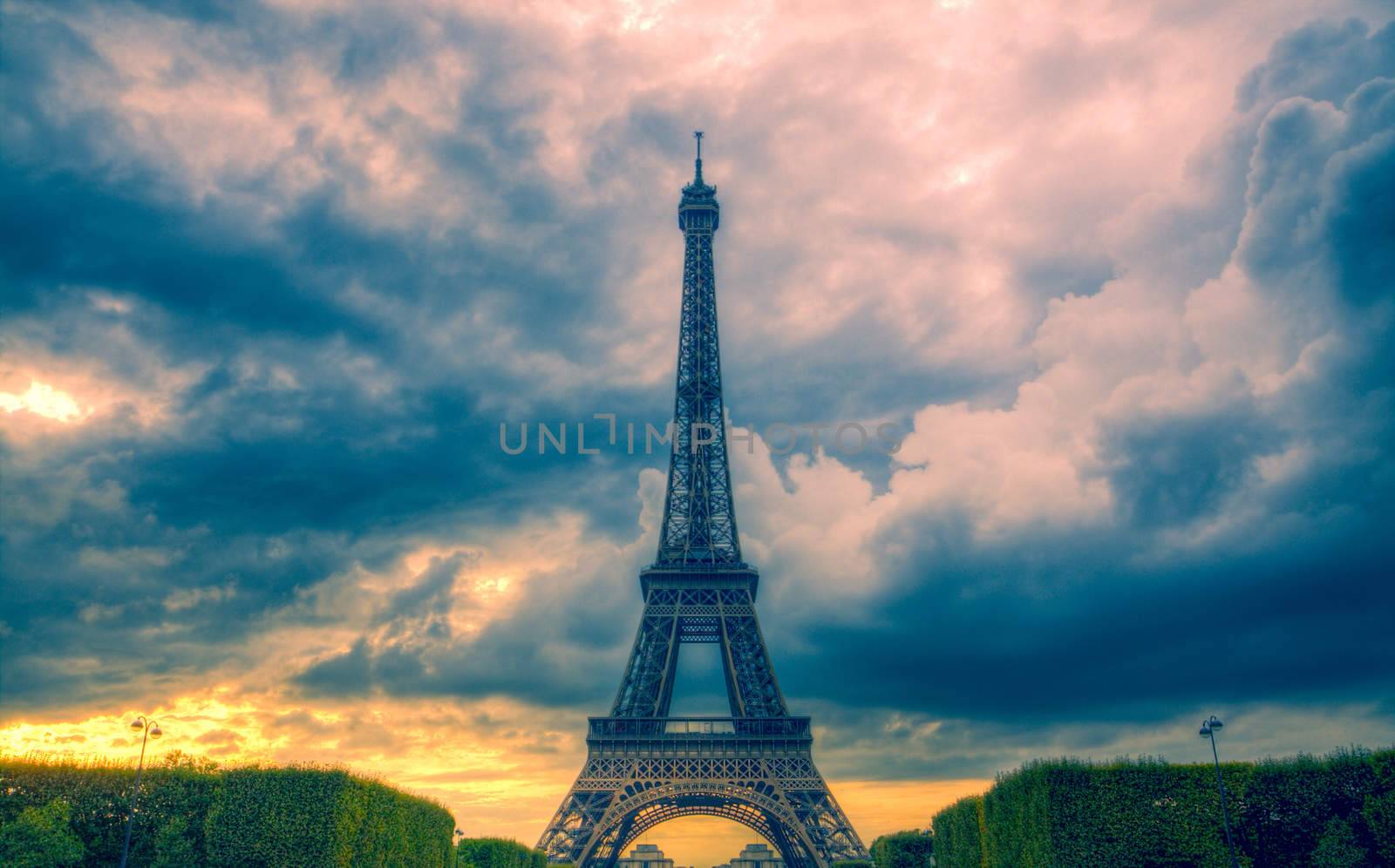 Eiffel tower and clouds by Harvepino