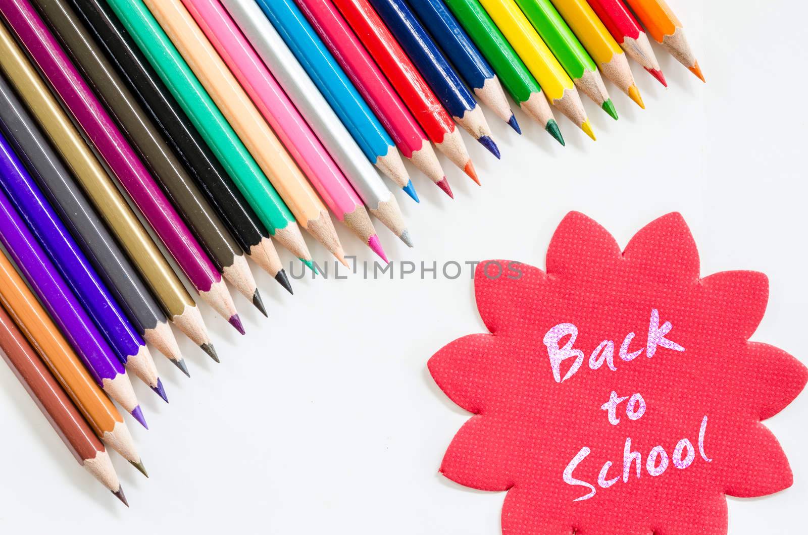 Colorful pencil crayons on a white background, Back to school