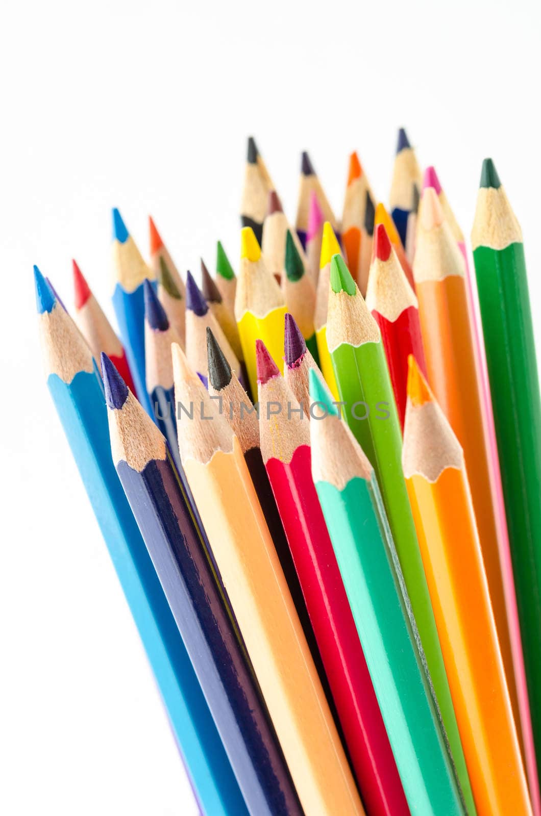 Colouring crayon pencils on white background