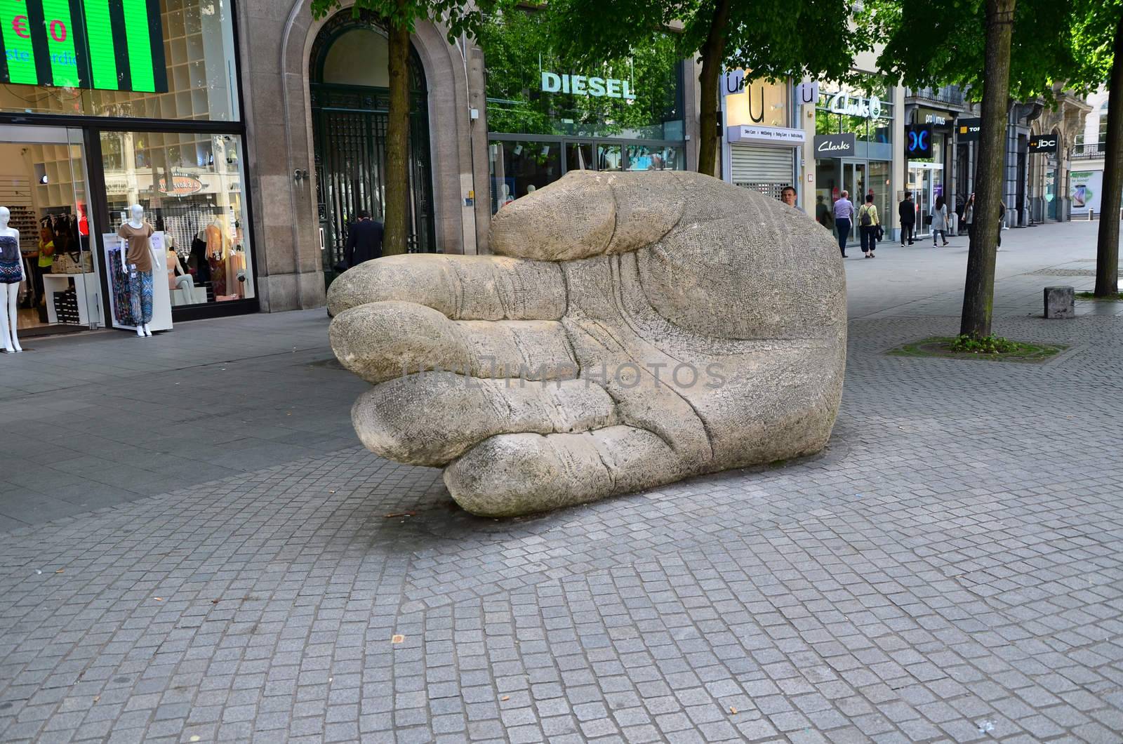 Antwerp, Belgium - May 10, 2015: Giant Hand statue on Meir street, The main shopping street in Antwerp, Belgium
