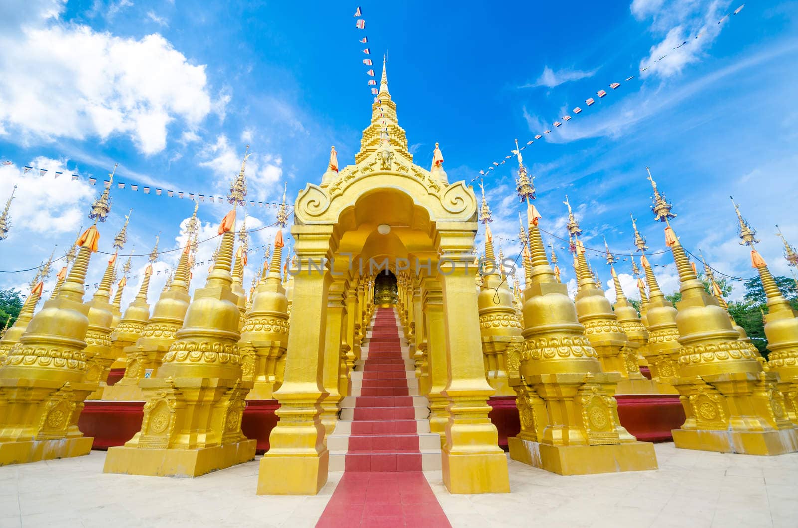 Golden pagoda at Wat pa sawang boon temple Thailand by Gamjai
