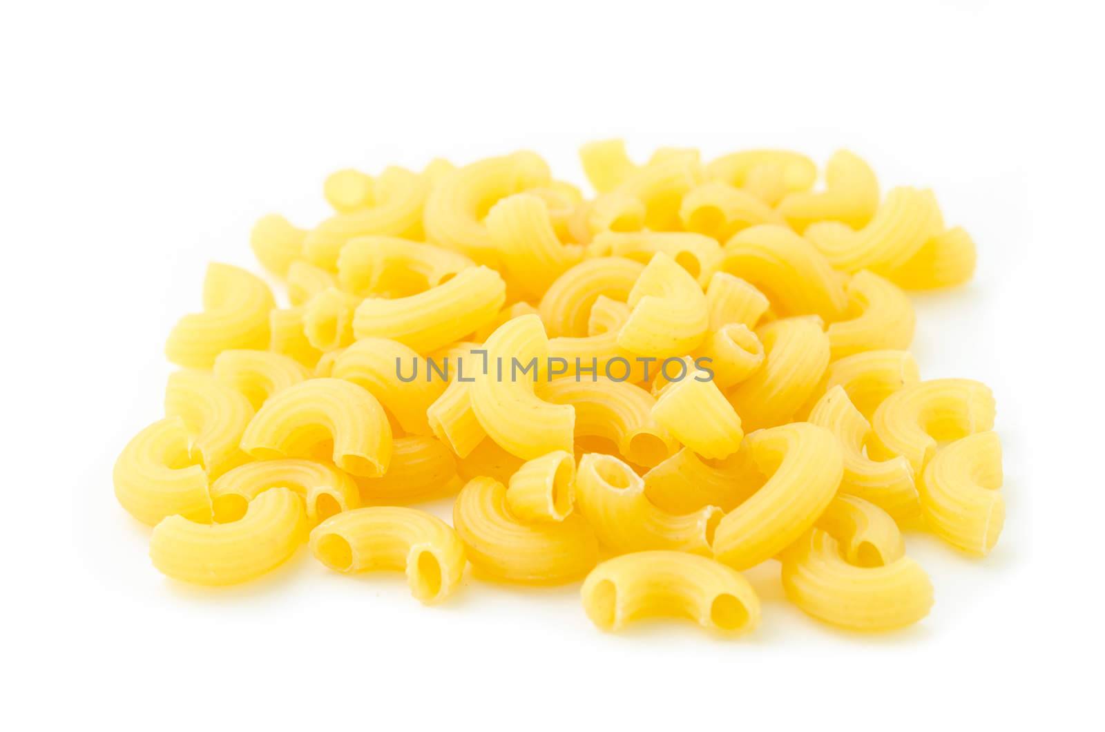 Raw Elbow Macaroni (Gomiti Pasta) Isolated on White Background