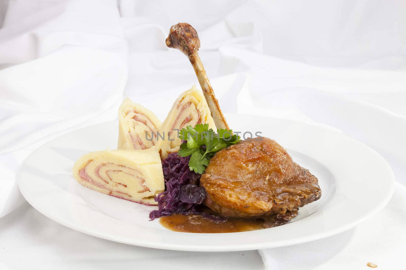 Baked duck leg with potato ham rolls by hanusst