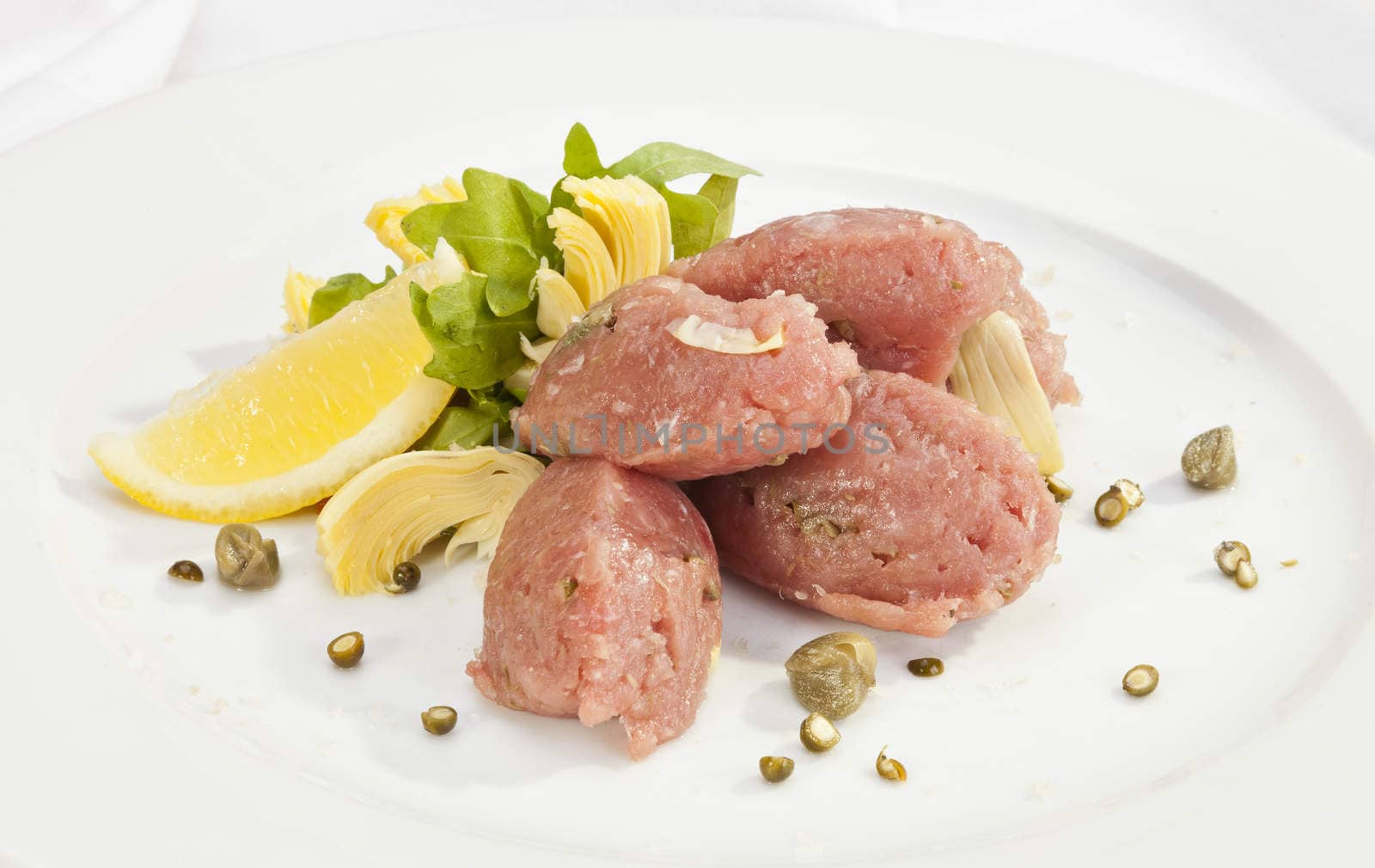 Veal steak tartar with caper and fresh artichoke