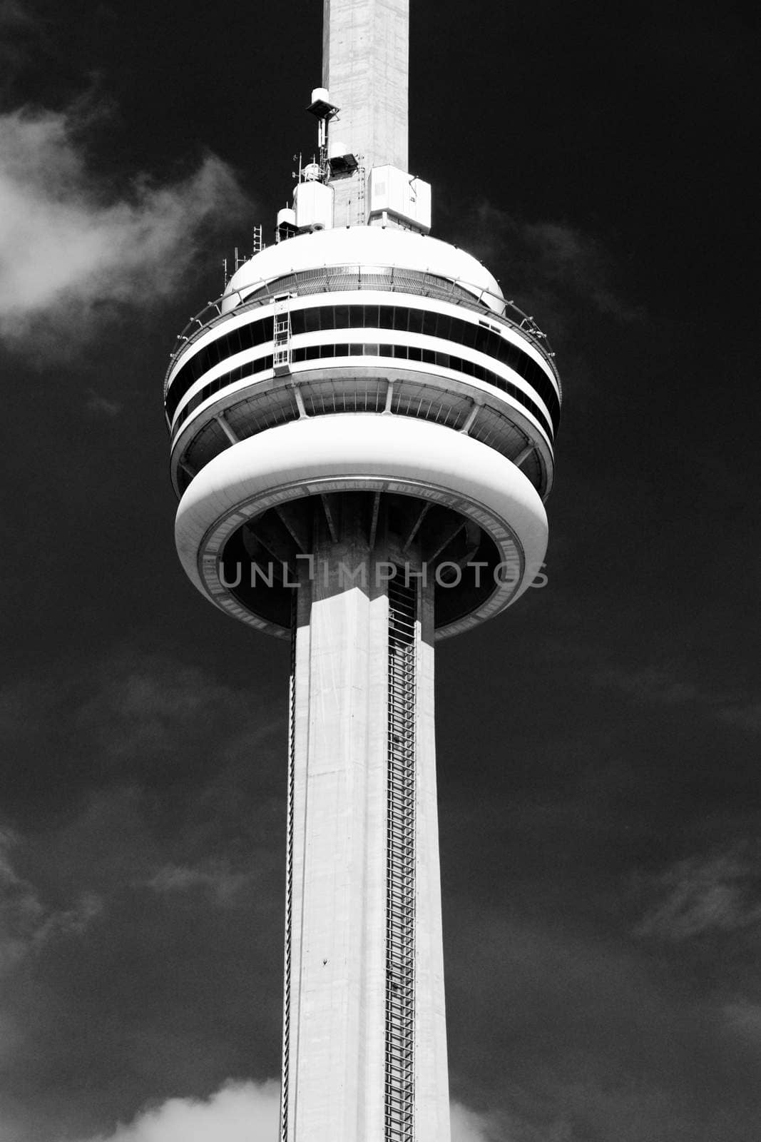 Black and white photo of the CN Tower by teo