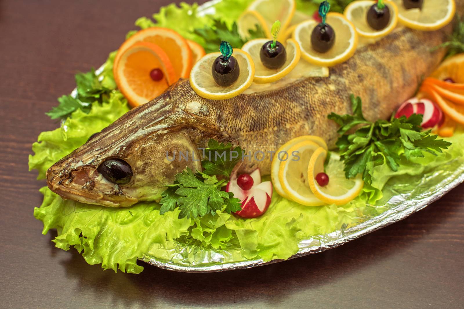 zander fish baked with greens fruits and vegetables