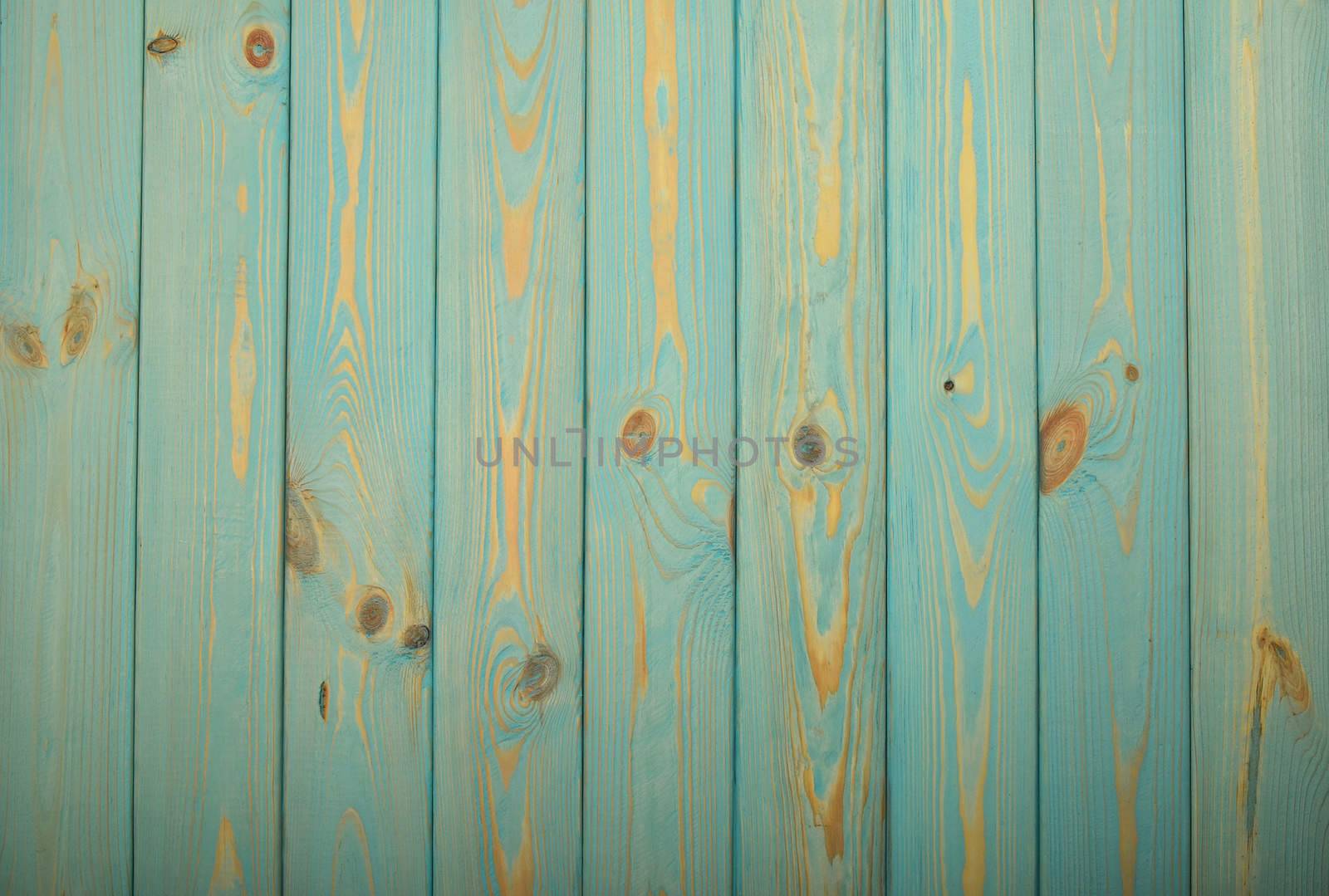 Light blue vintage rustic aged painted wooden panel with vertical planks