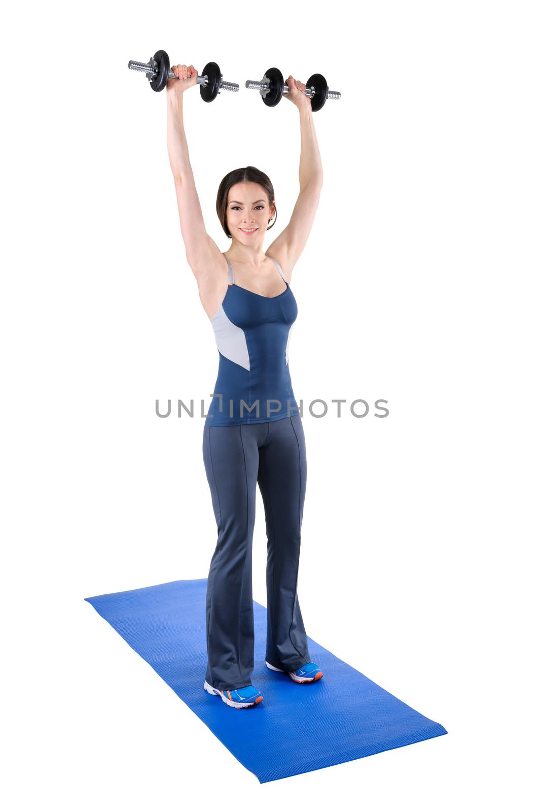 young woman shows finishing position of shoulder press by starush