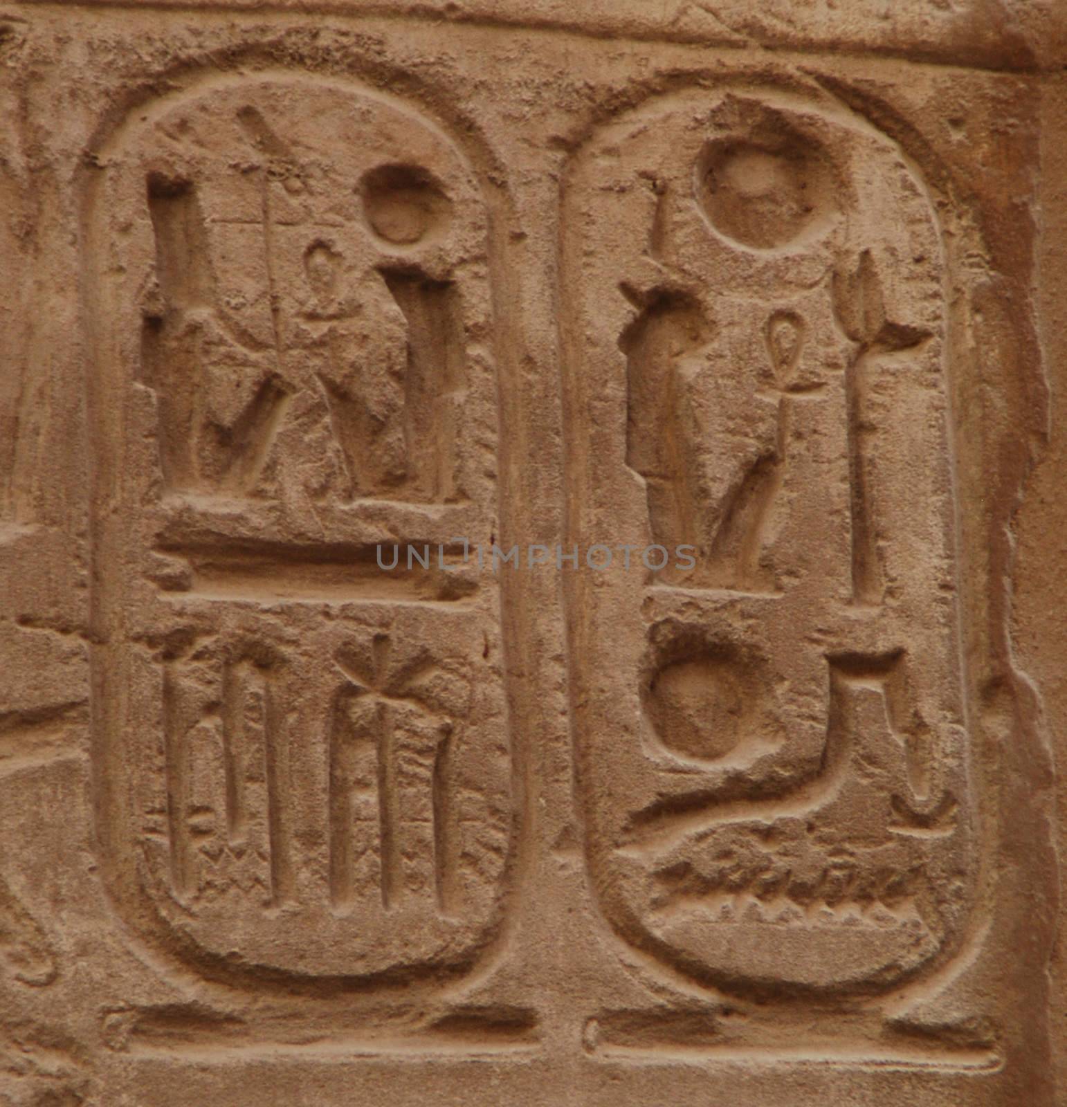 Hieroglyphics on the stove in the Karnak Temple Complex. by olga_ovchinnikova