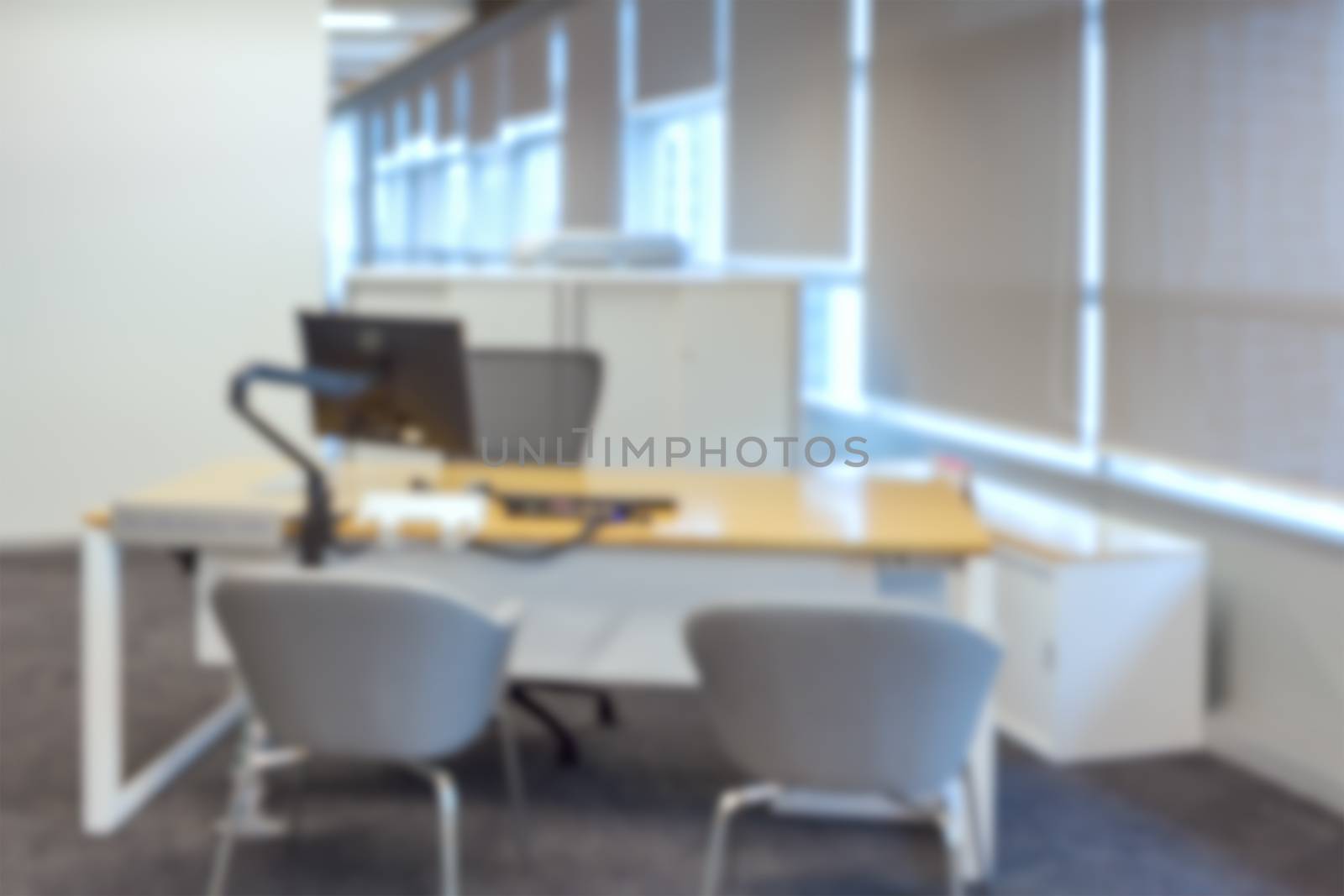 abstract business office desk with computer blur background by FrameAngel
