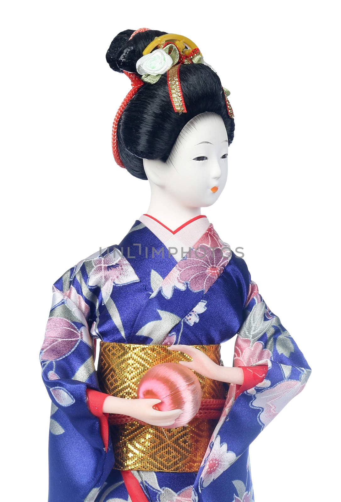 Isolated Japanese girl doll in Blue kimono