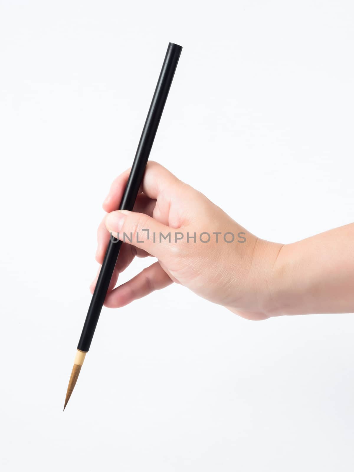 woman hand and black brush on white background
