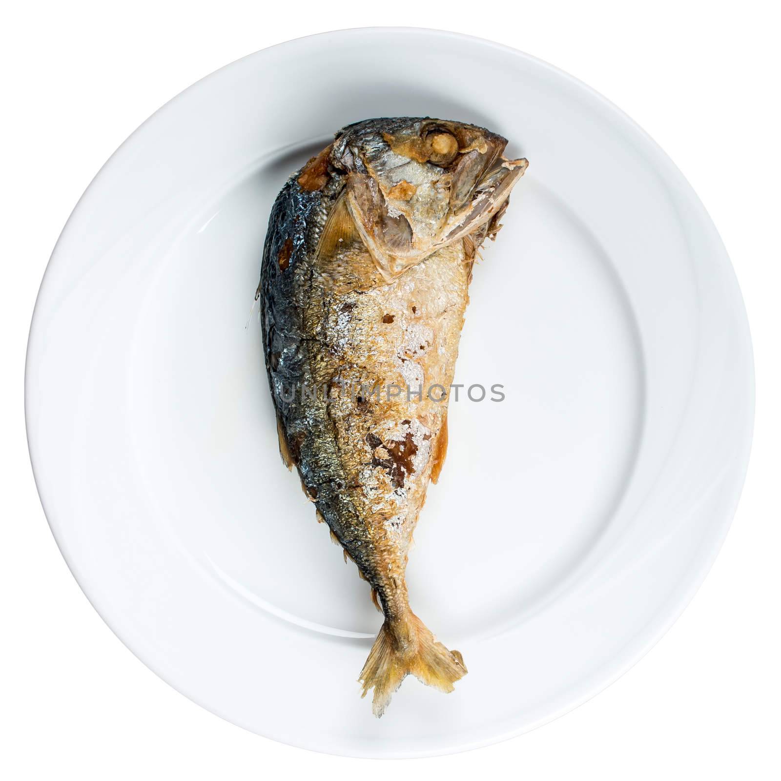 Fried mackerel on white dish , favorite food of Thai people