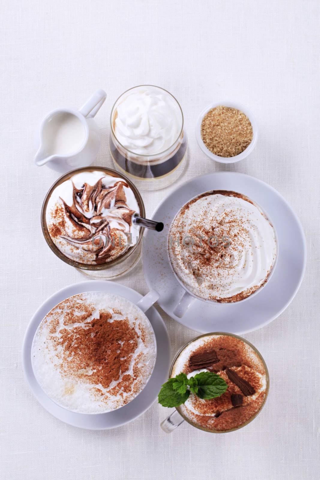 Variety of coffee and chocolate drinks - overhead