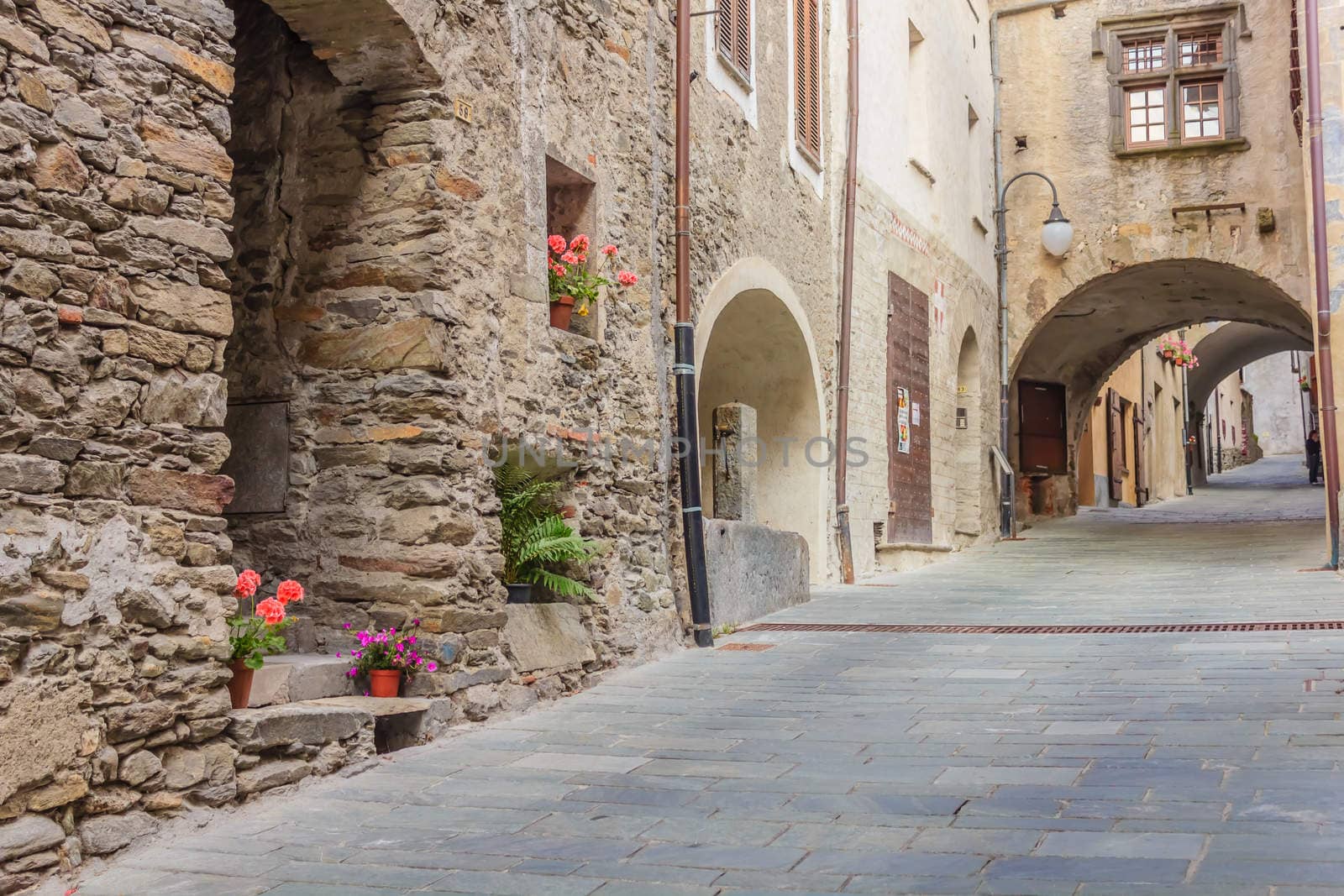 a quiet medieval village with its typical stone-houses ,the arches and the stone-flooring  uphill