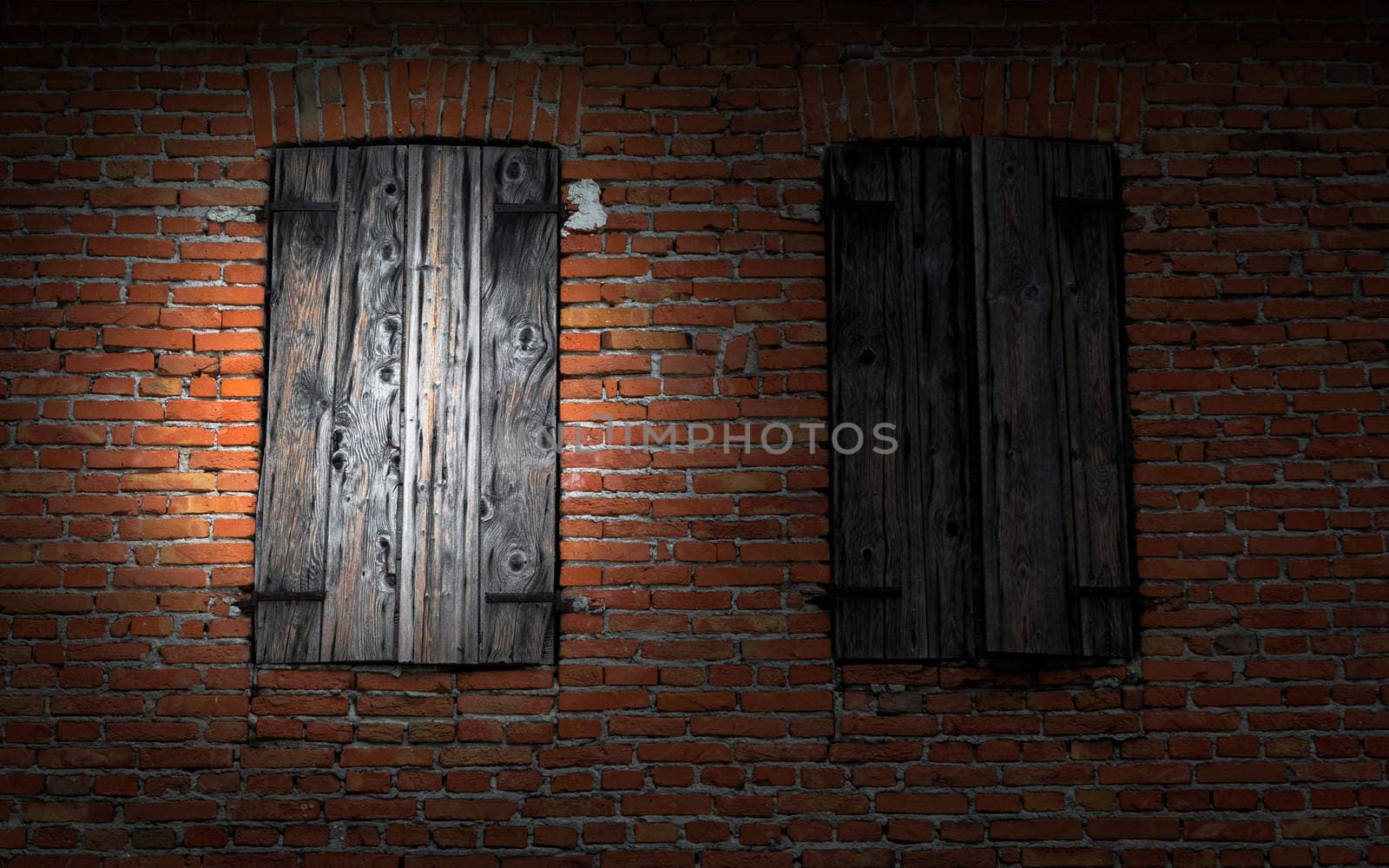 Window on brick wall illuminated by a flashlight. by Isaac74