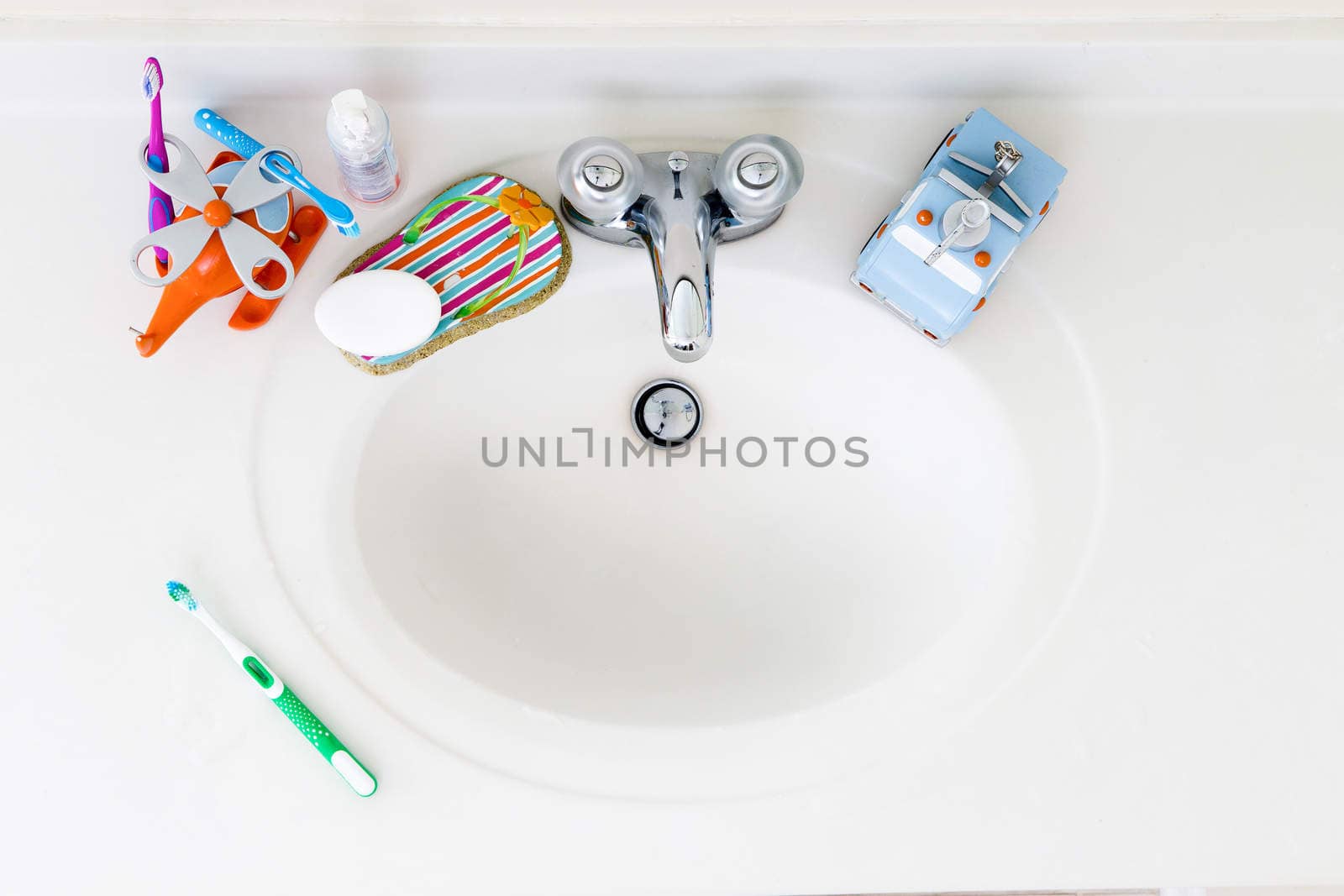 Kids Domestic Bathroom Sink with toothbrushes and hand soap