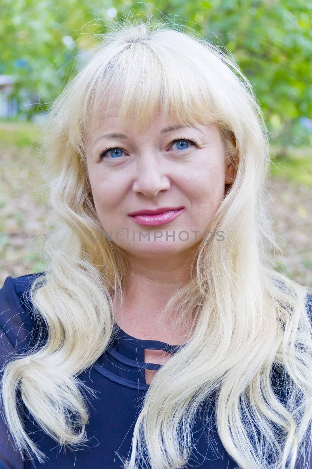 European blond woman with long hair and blue eyes
