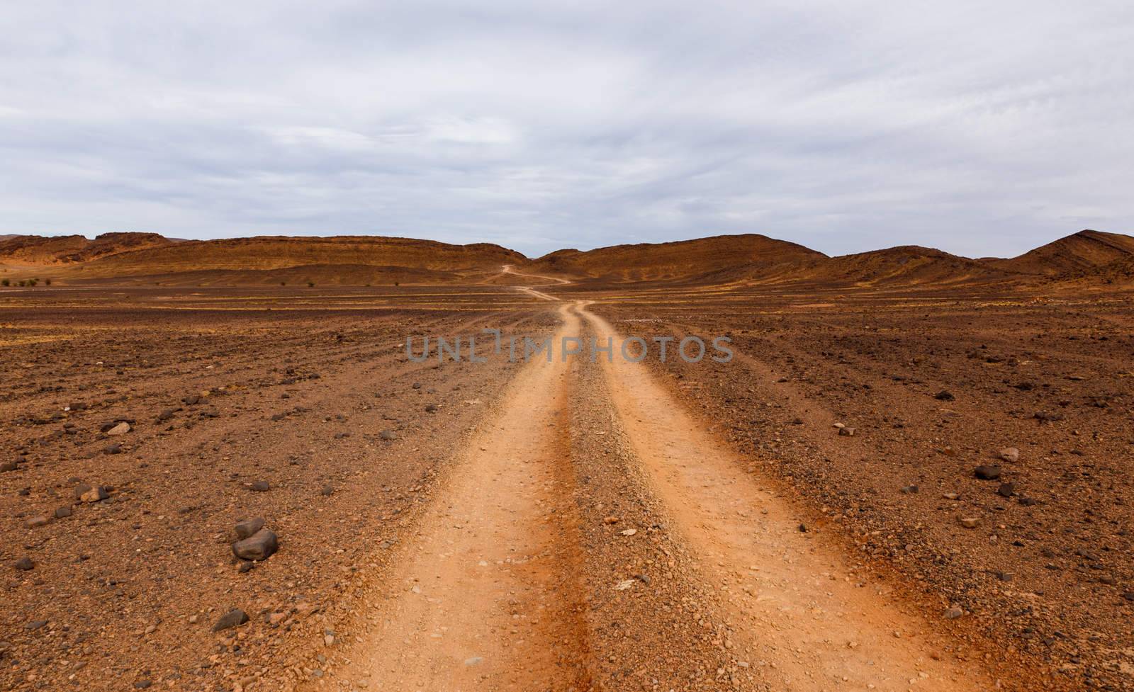 road to the Sahara desert comes to mountains, Morocco