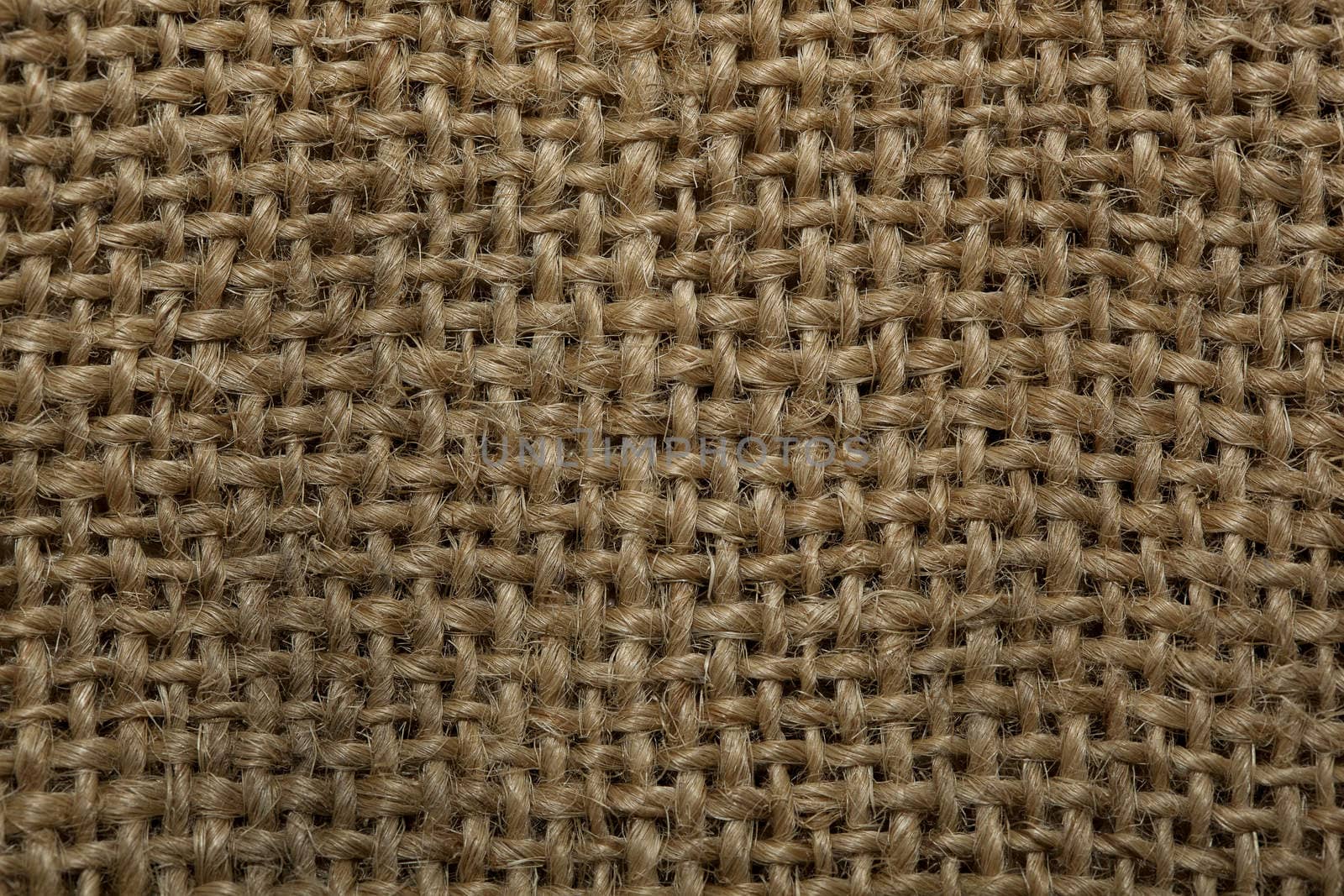 The texture of coarse cloth woven from thick thread.