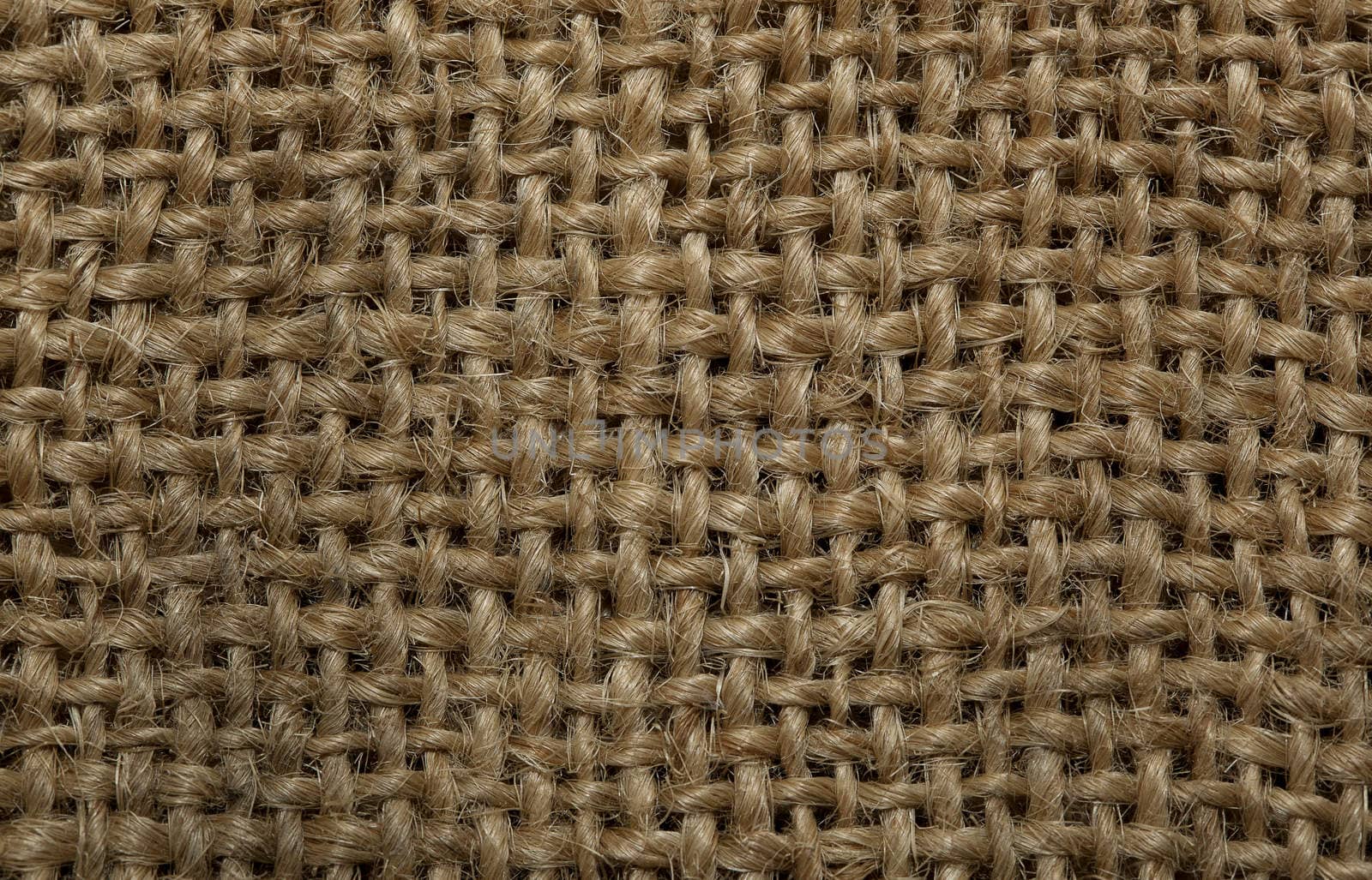 The texture of coarse cloth woven from thick thread.