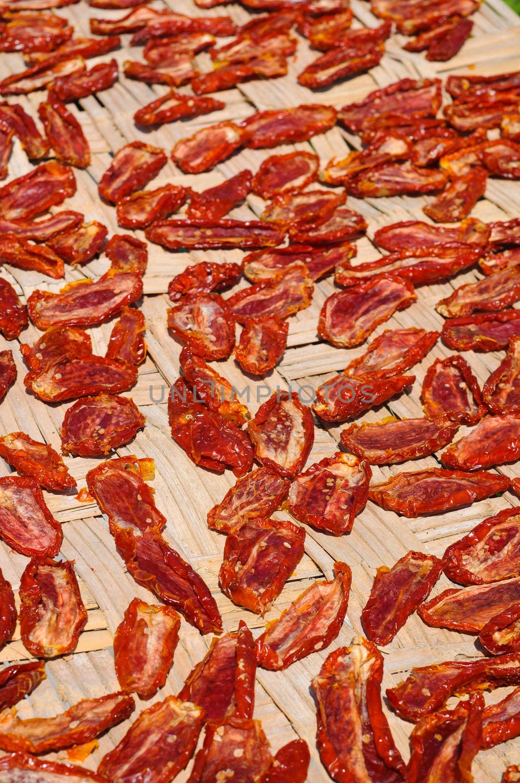 Tomatoes put in the sun to make them dry from italy