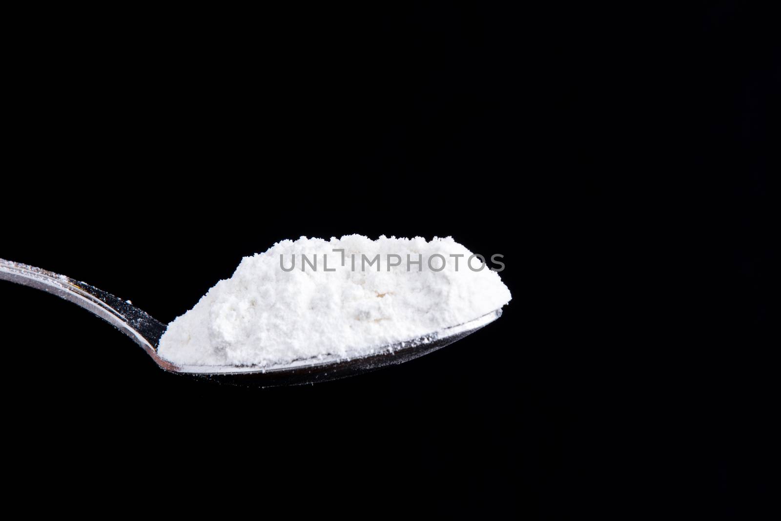 Could be used for drugs or cooking as it is a generic looking white powder