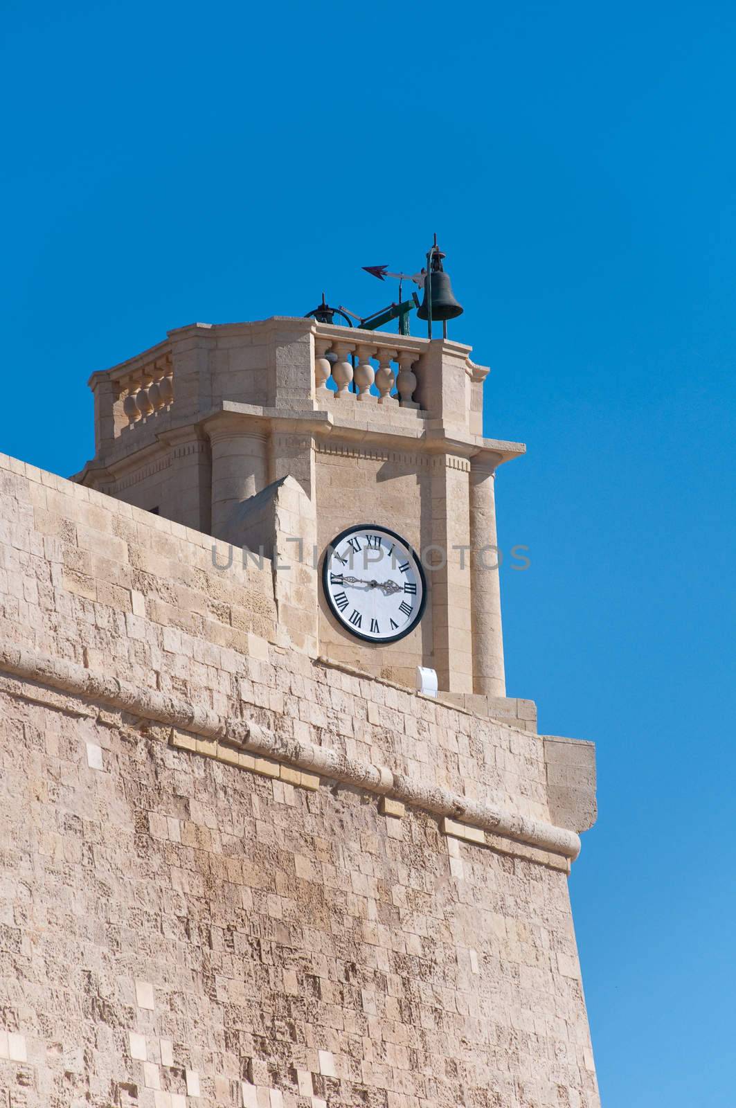 The walls of the fortress of Victoria, Rabat, with the clock, Gozo, Malta